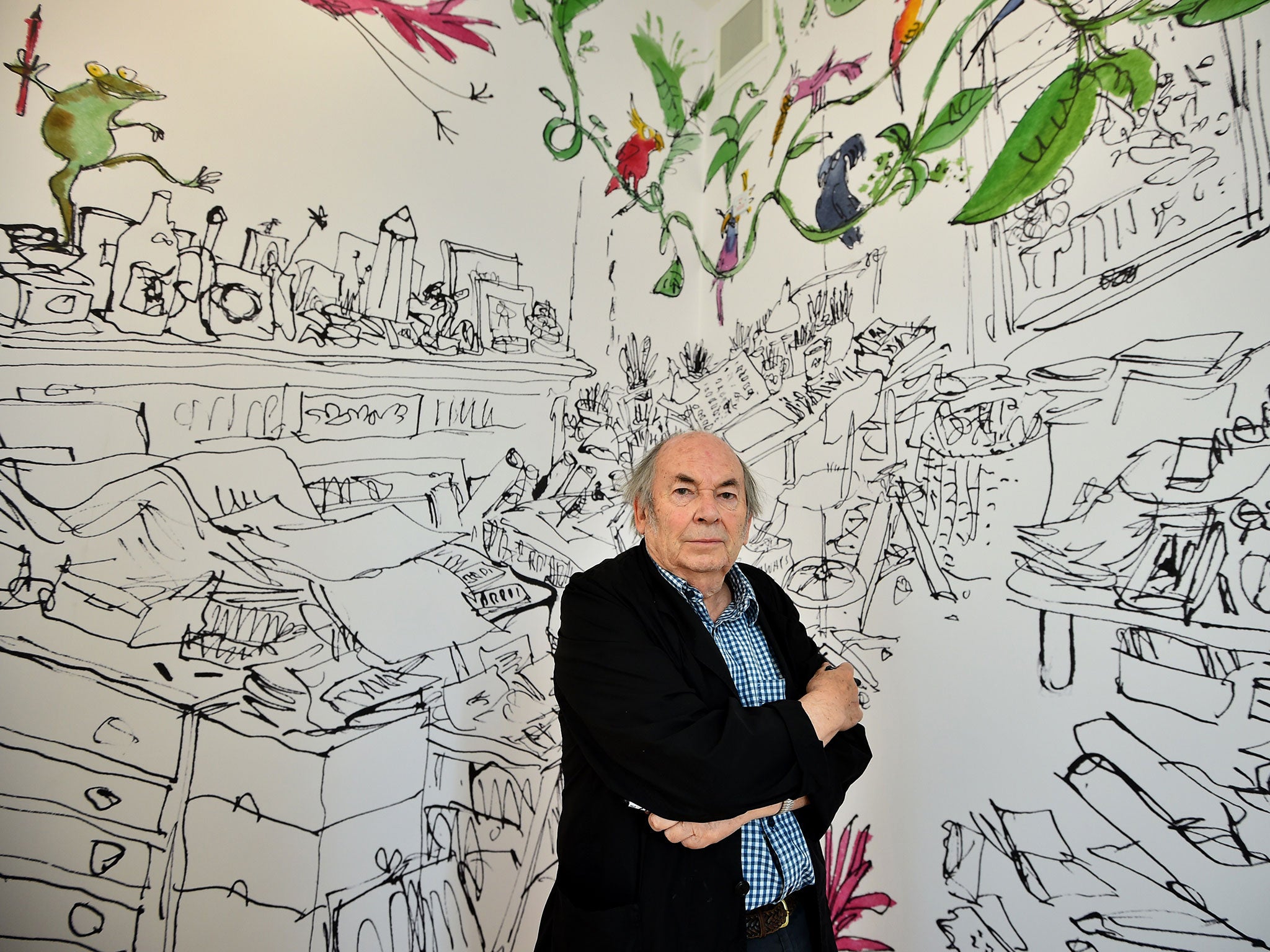 Quentin Blake poses at his 'Inside Stories' exhibition at the new House of Illustration in London