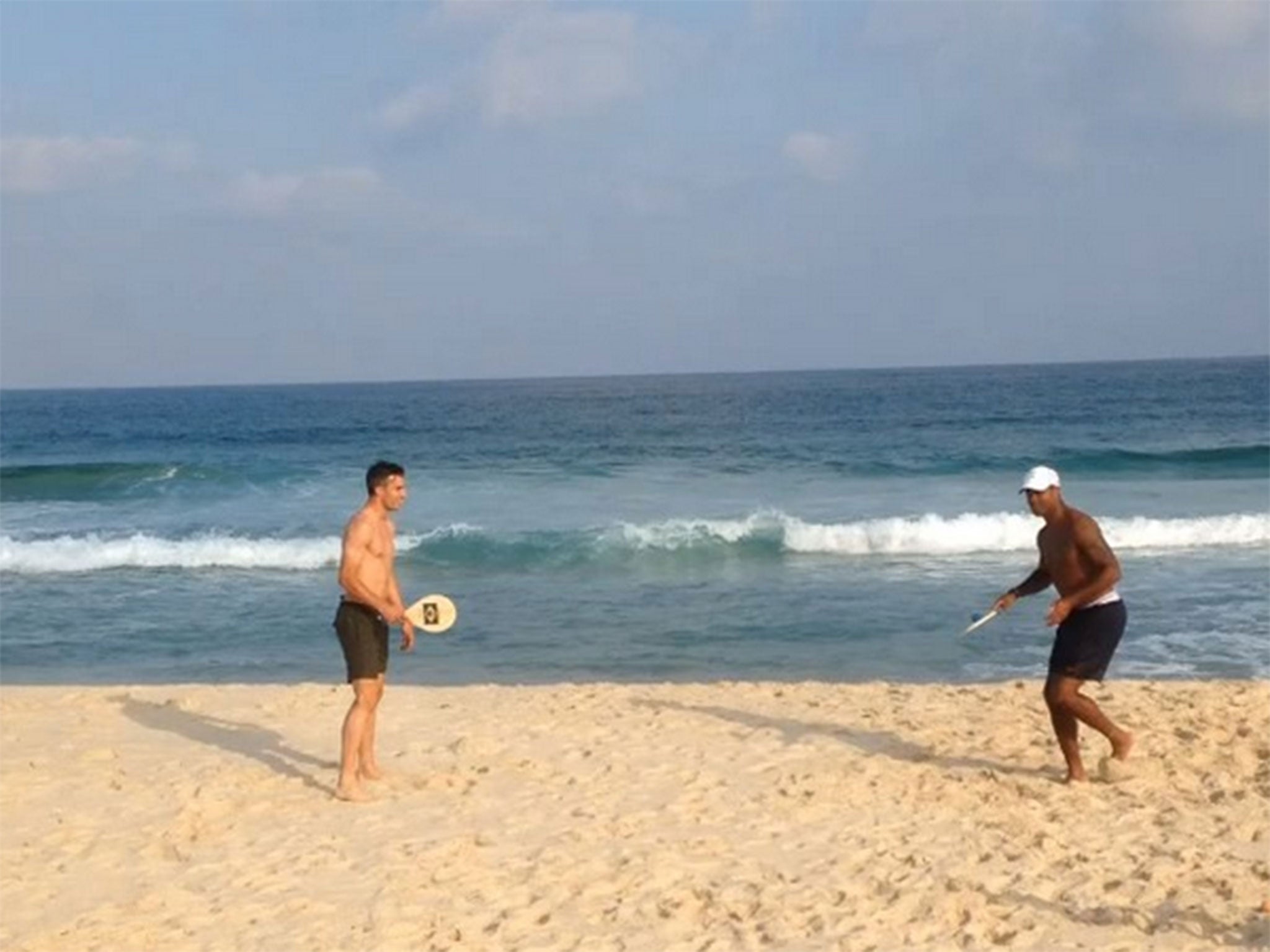 Robin van Persie and Patrick Kluivert play beach tennis in Brazil