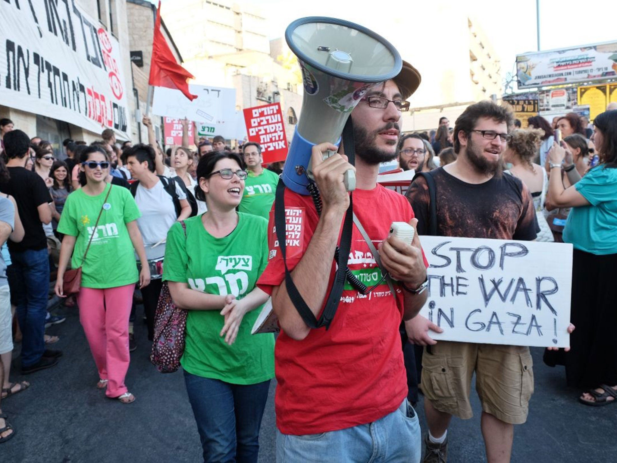 Marchers call for an end to the violence and revenge in Jerusalem