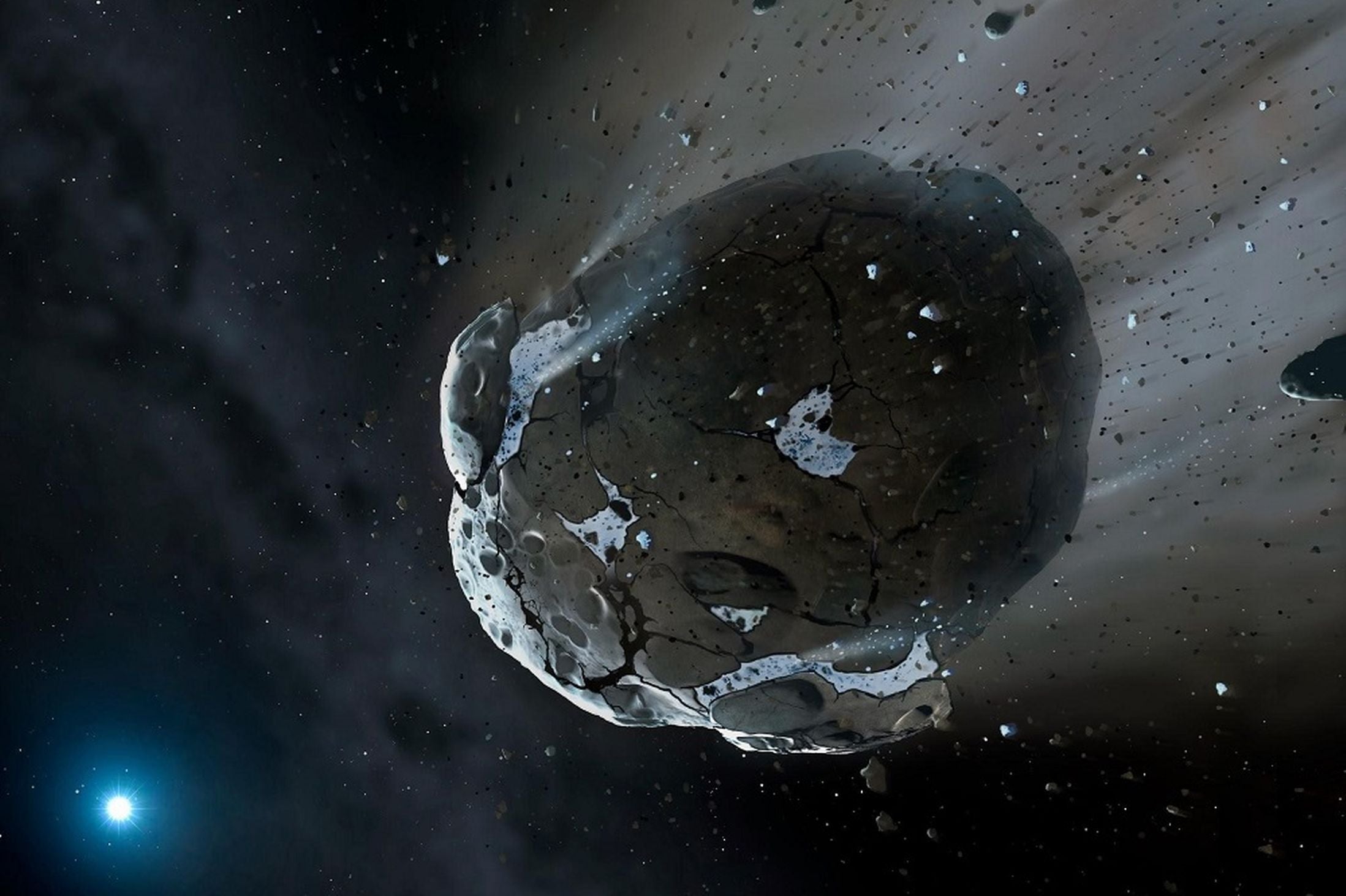 An artist's view of a watery asteroid in a white dwarf star system.