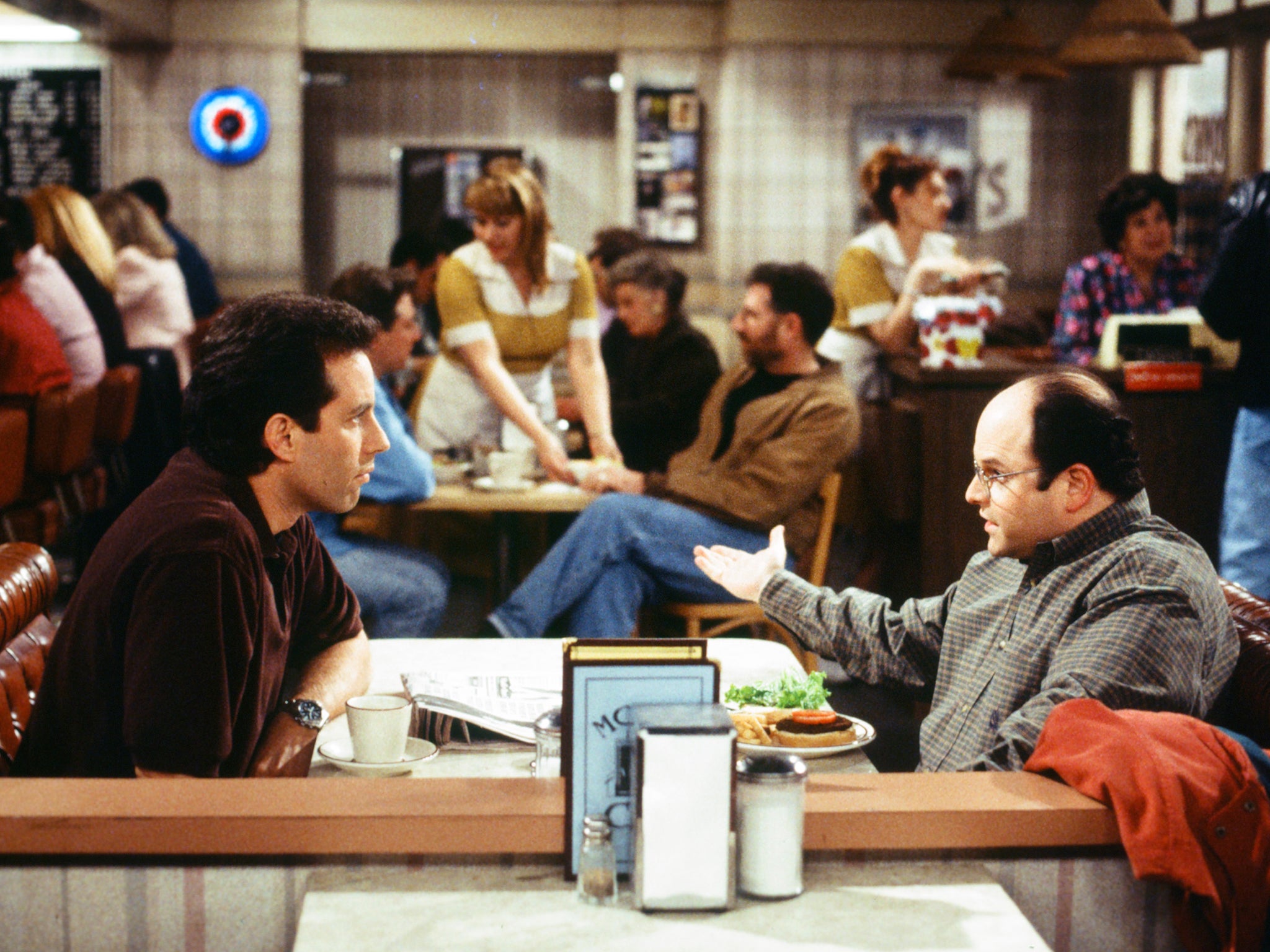 Jerry and George deep in conversation at Monk's Diner (NBC)