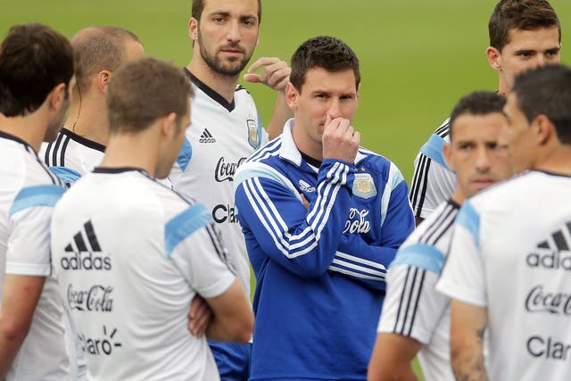 Lionel Messi (centre) must be wondering if his Argentina team-mates will take on the creative burden