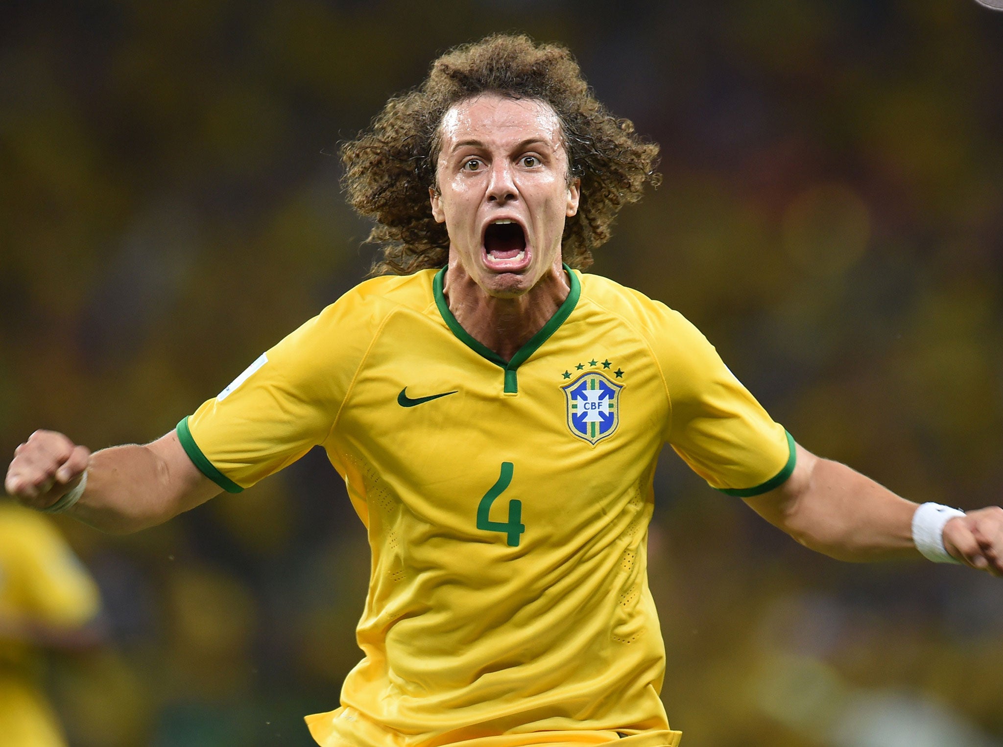 David Luiz wheels away in celebration