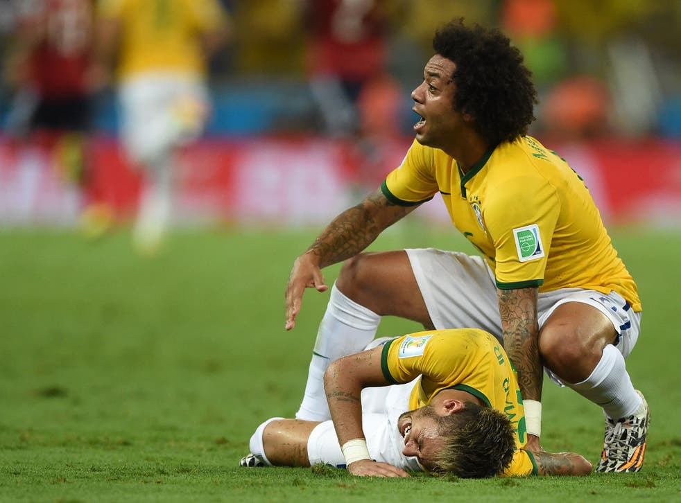 Marcelo comes to the aid of his team-mate 