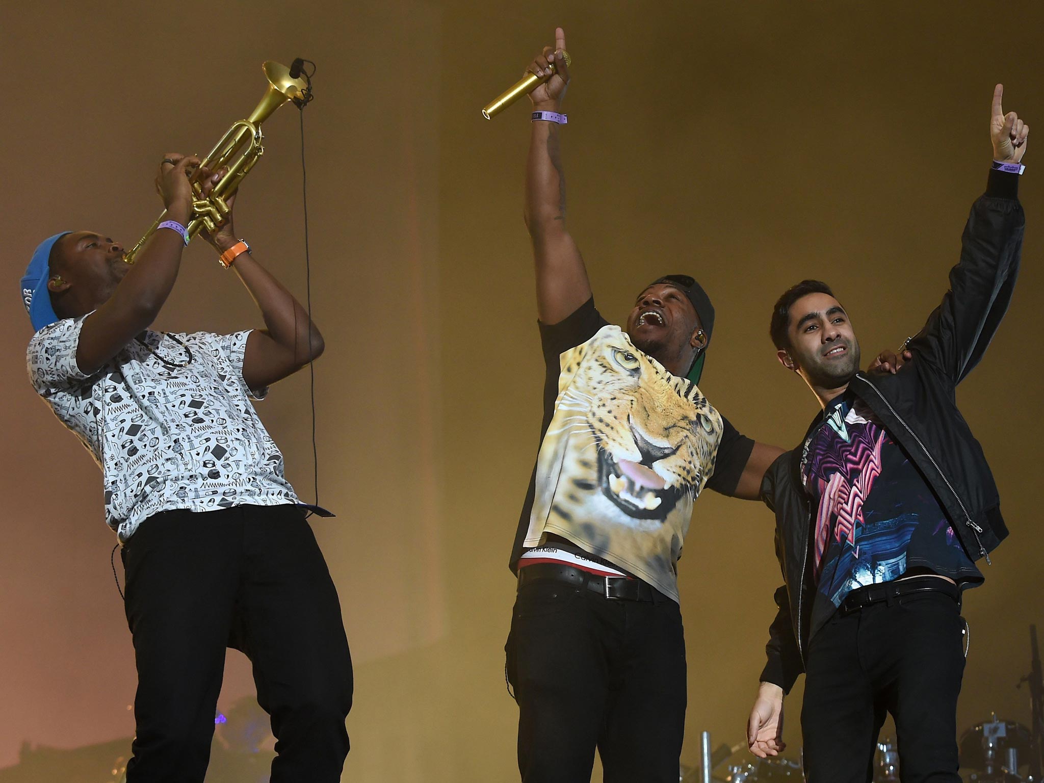 From left to right: Mark Crown, DJ Locksmith and Amir Amor of Rudimental performing on stage during day one of the Wireless Festival at Perry Park, Birmingham