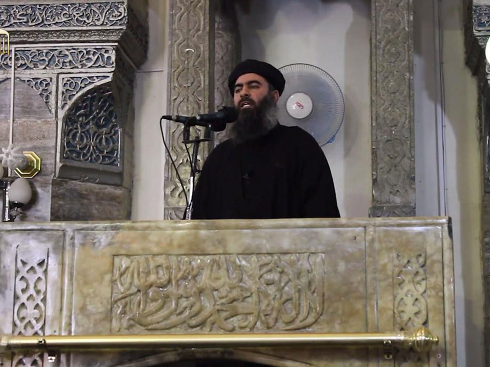 Abu Bakr al-Baghdadi speaking at the Grand Mosque in Mosul