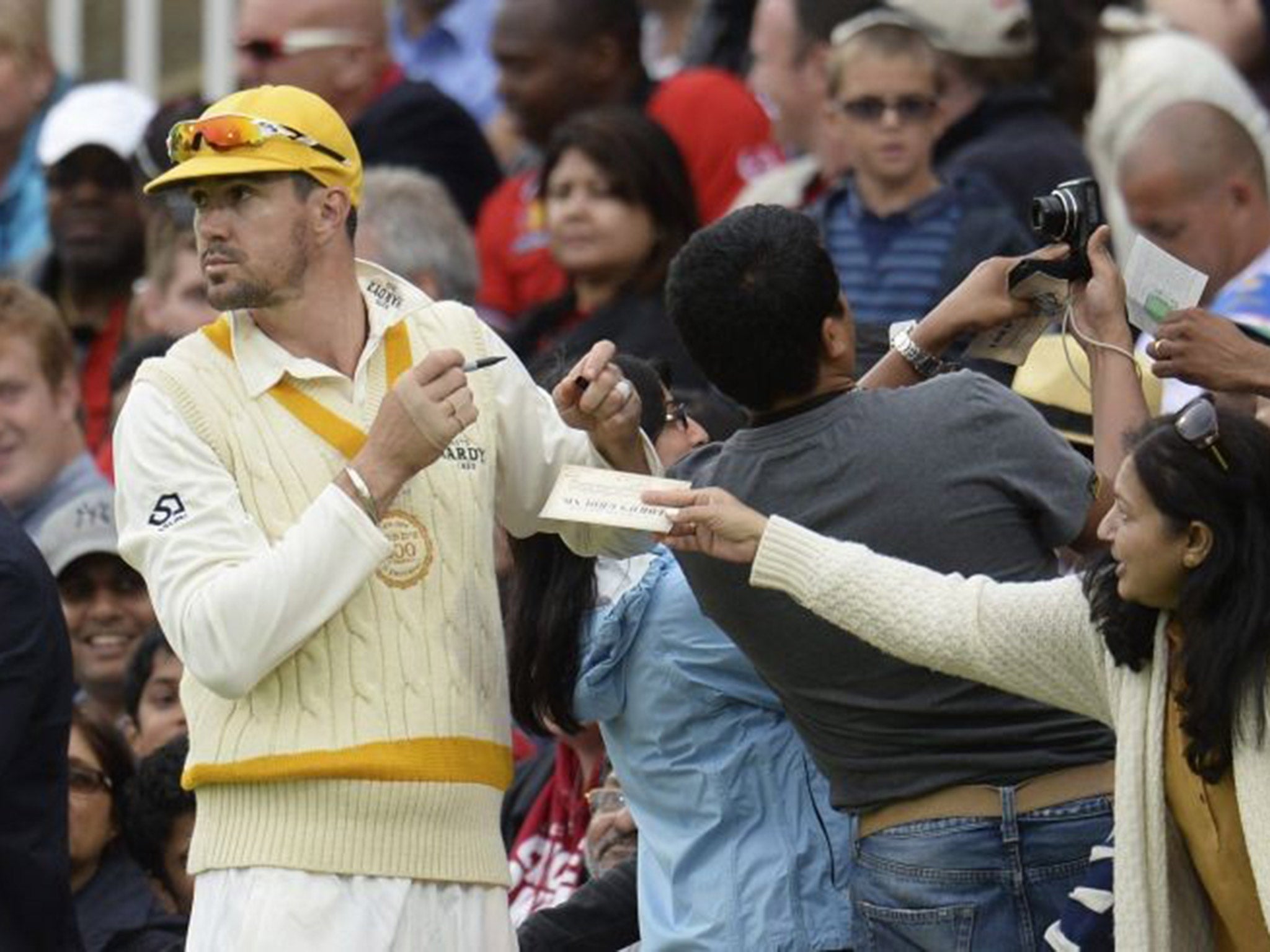 Pietersen signing autographs