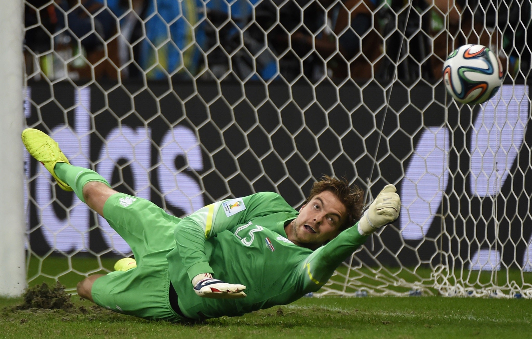 Substitute goalkeeper Tim Krul saves a penalty in the quarter-final shootout victory over Costa Rica