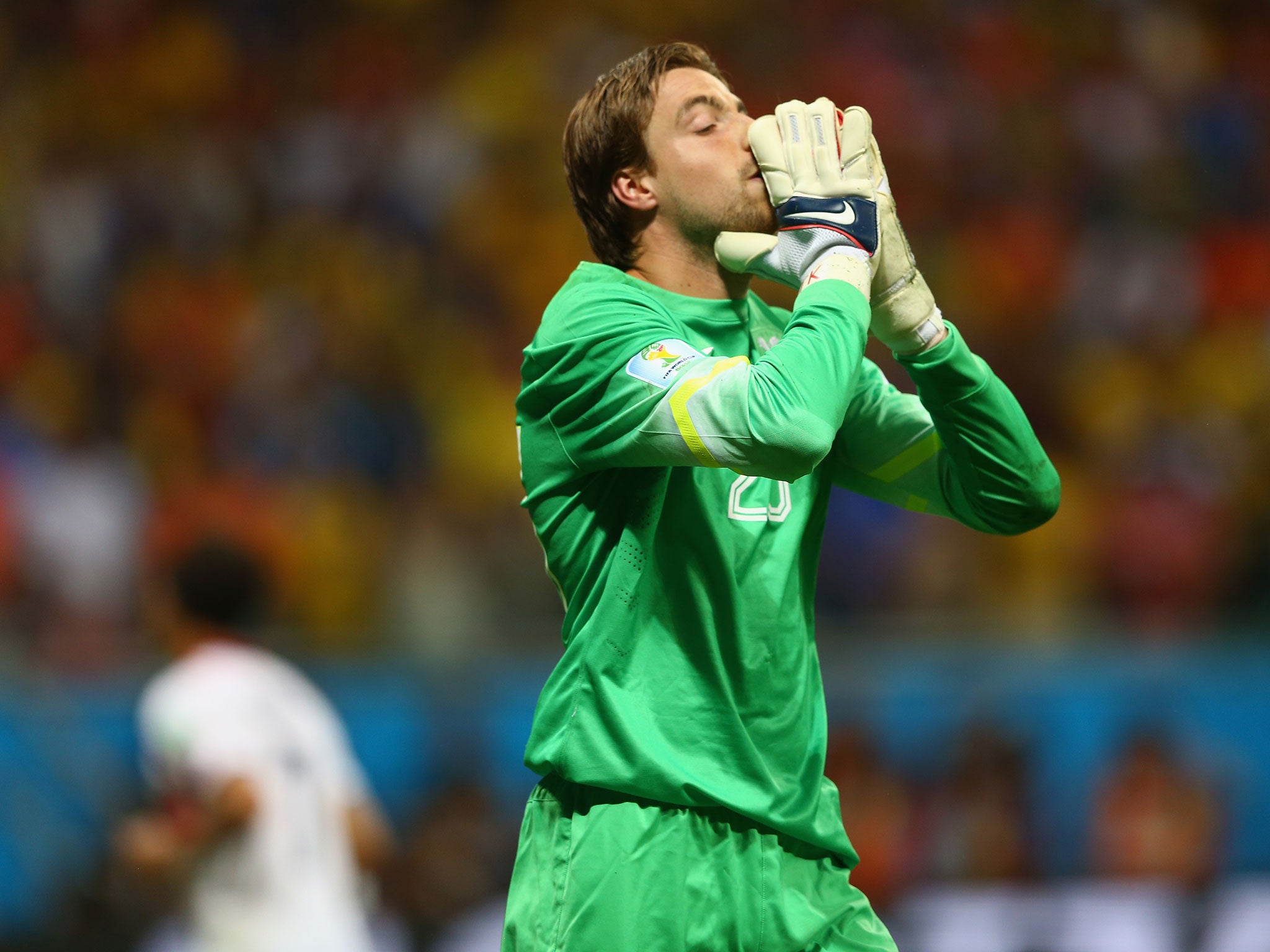 Netherlands' substitute goalkeeper Tim Krul celebrates after saving two penalties in the shootout victory over Costa Rica