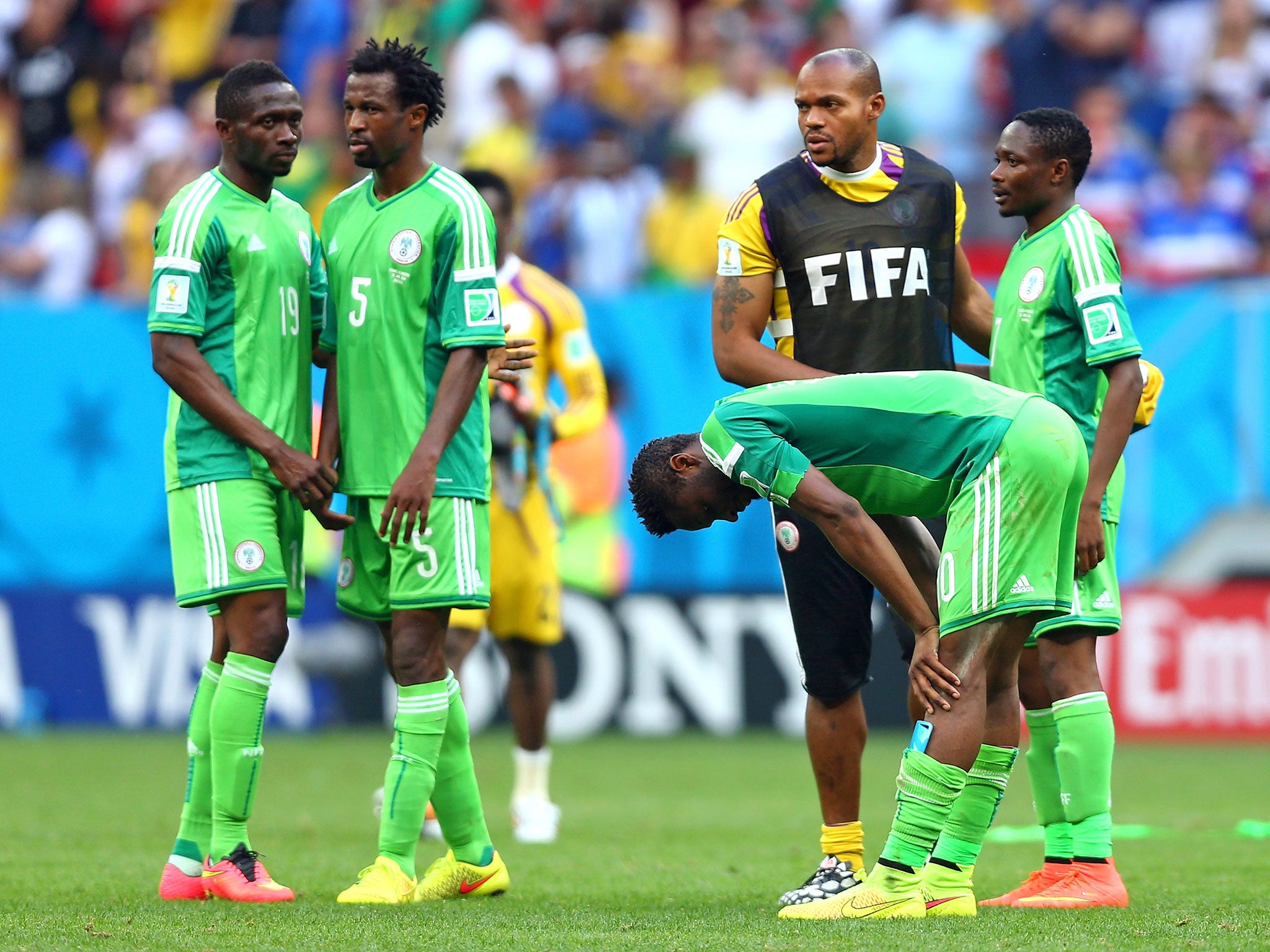 Nigeria players react after their 2-0 by France at the World Cup
