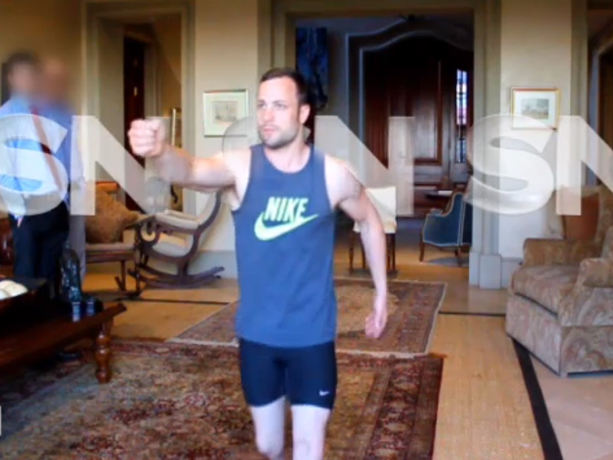 Oscar Pistorius is seen running without his prosthetic legs and pretending to hold a gun. Picture: Yahoo/Channel 7