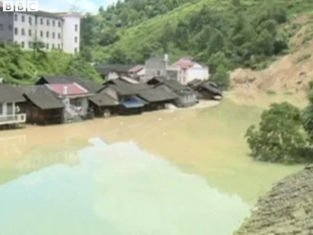 The flooding in China's Hunan province caused by torrential rainfall is 150 square kilometres and 7 metres deep in some places. Picture: BBC