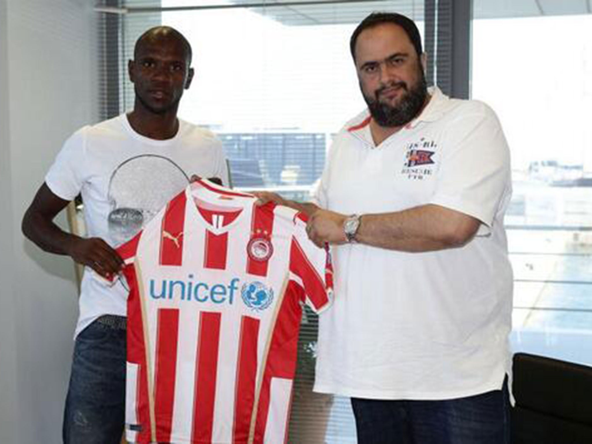 Abidal posted this picture with the caption (in French): "Very happy to have signed with Olympiakos. Thank you for the welcome and your confidence."