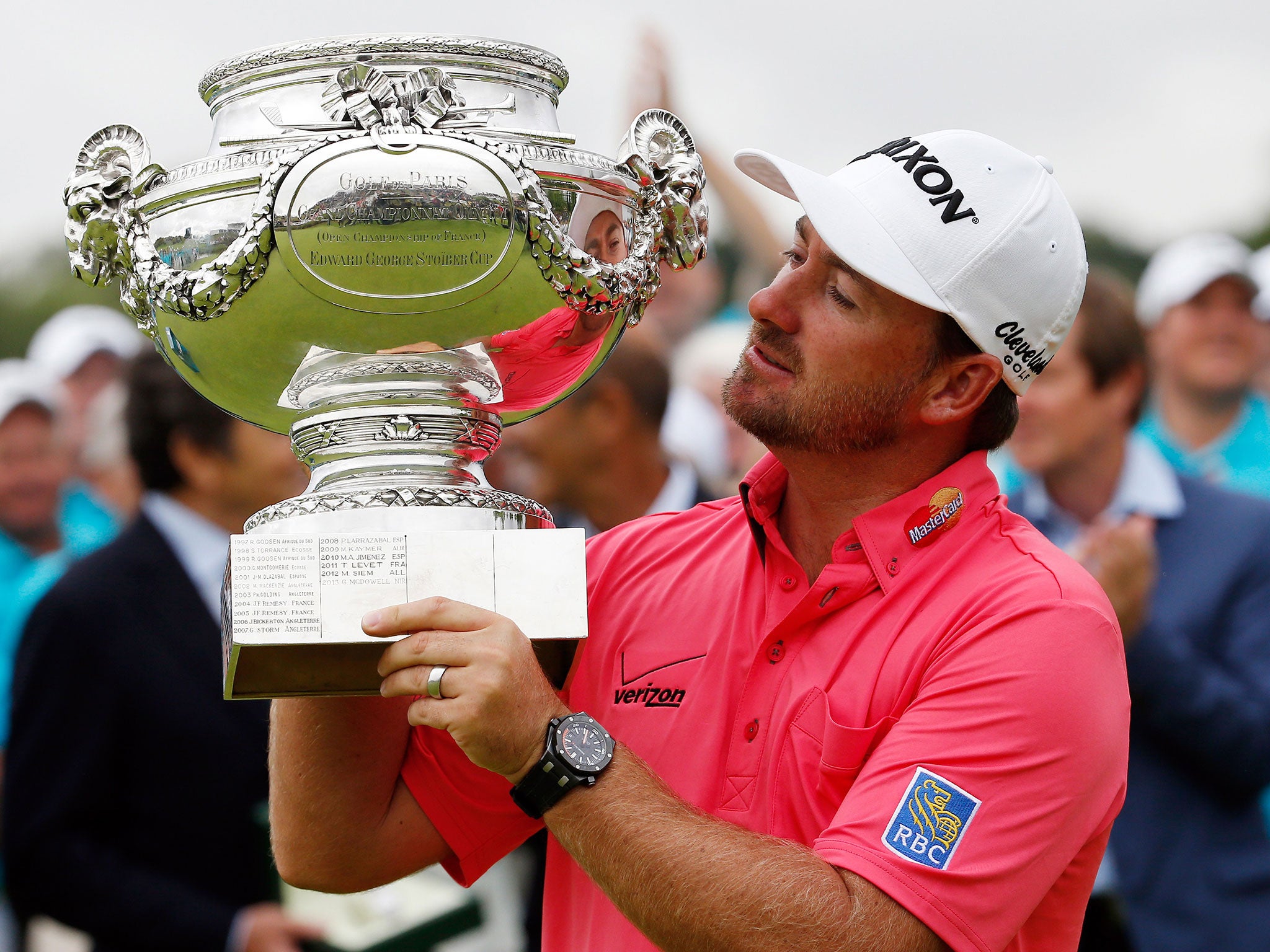 Graeme McDowell of Northern Ireland poses with the trophy after winning the Alstom Open de France - Day Four at Le Golf National on July 6, 2014 in Paris, France
