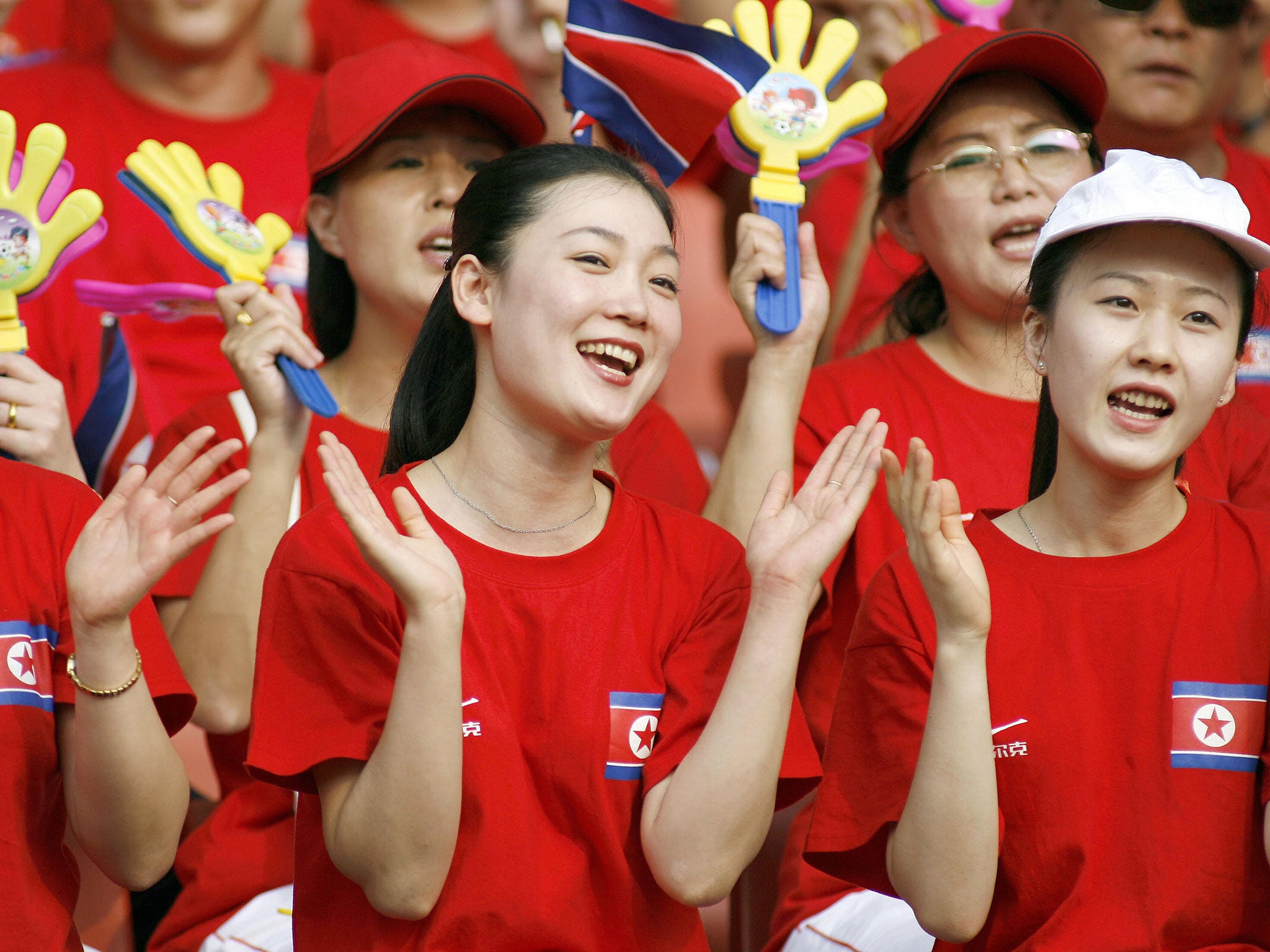 North Korean cheerleaders show support for their team before a match against Germany in the women's football World Cup in Wuhan in 2007.