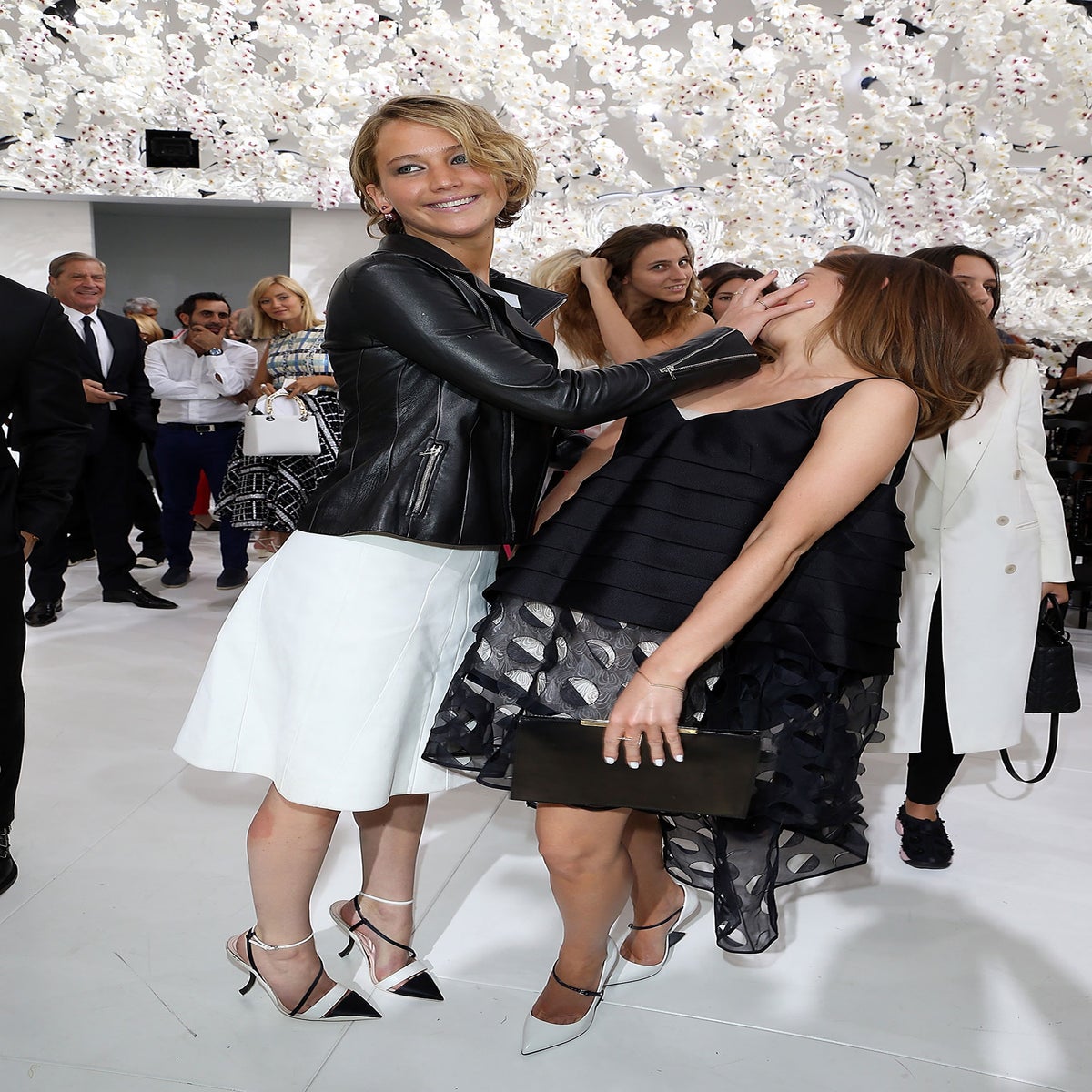 Jennifer Lawrence face palms Emma Watson at Christian Dior show in Paris |  The Independent | The Independent