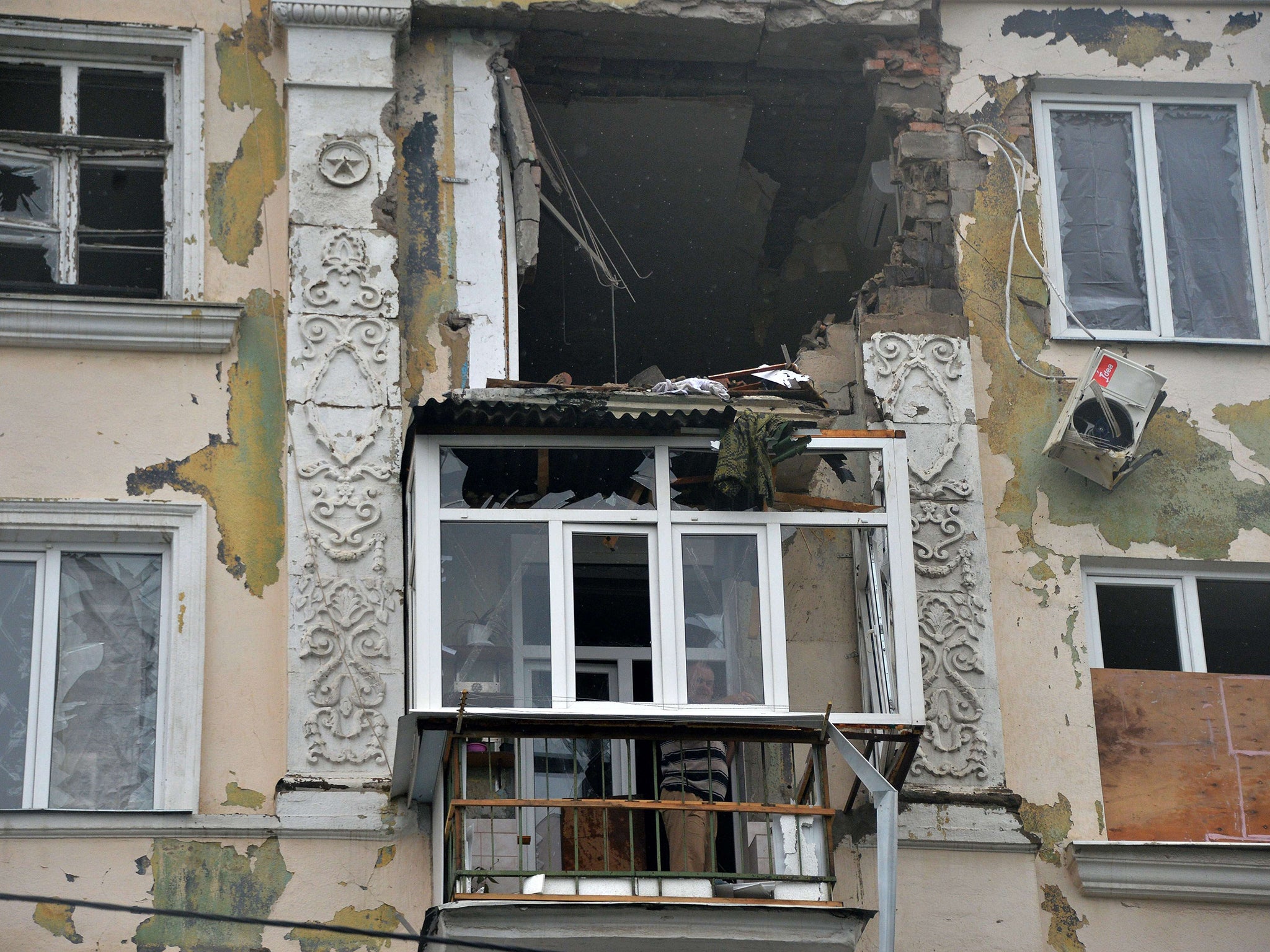 &#13;
The facade of a building in Kramatorsk, destroyed after fighting between Ukrainian troops and pro-Russian militants&#13;