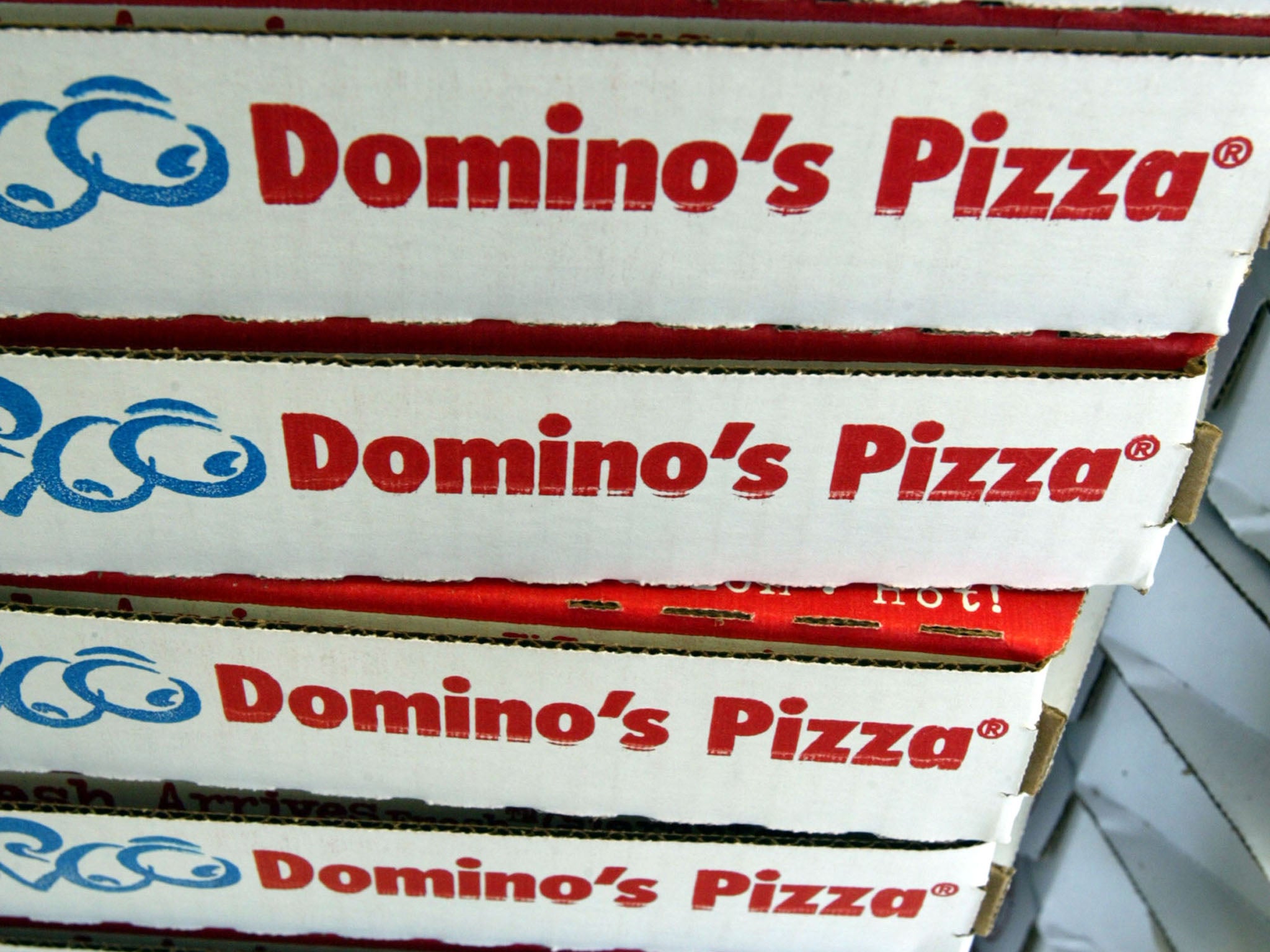 Three quarters of Domino's Pizza deliveries are now booked online, with half of those coming from mobile phone apps.