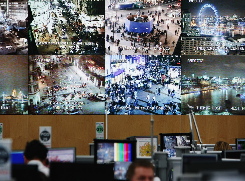 A bank of television monitors displays images captured by a fraction of London's CCTV camera network within the Metropolitan Police's Special Operations Room