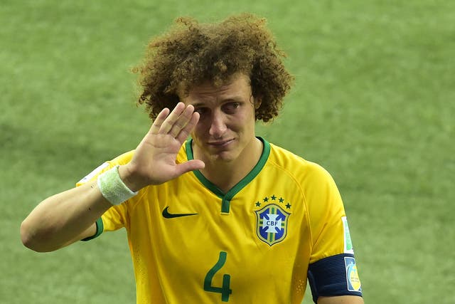A tearful David Luiz leaves the field