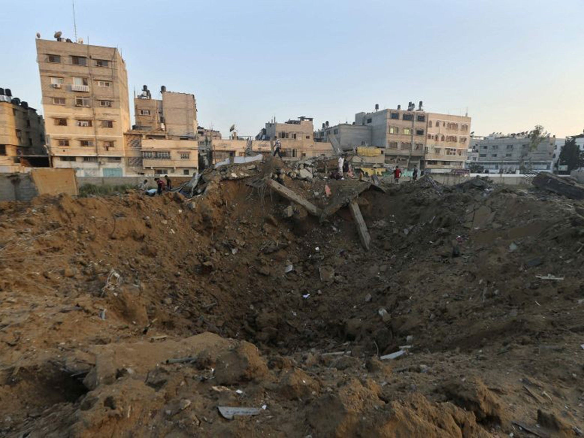 The rubble of a house which police said was destroyed in an Israeli air strike in Gaza