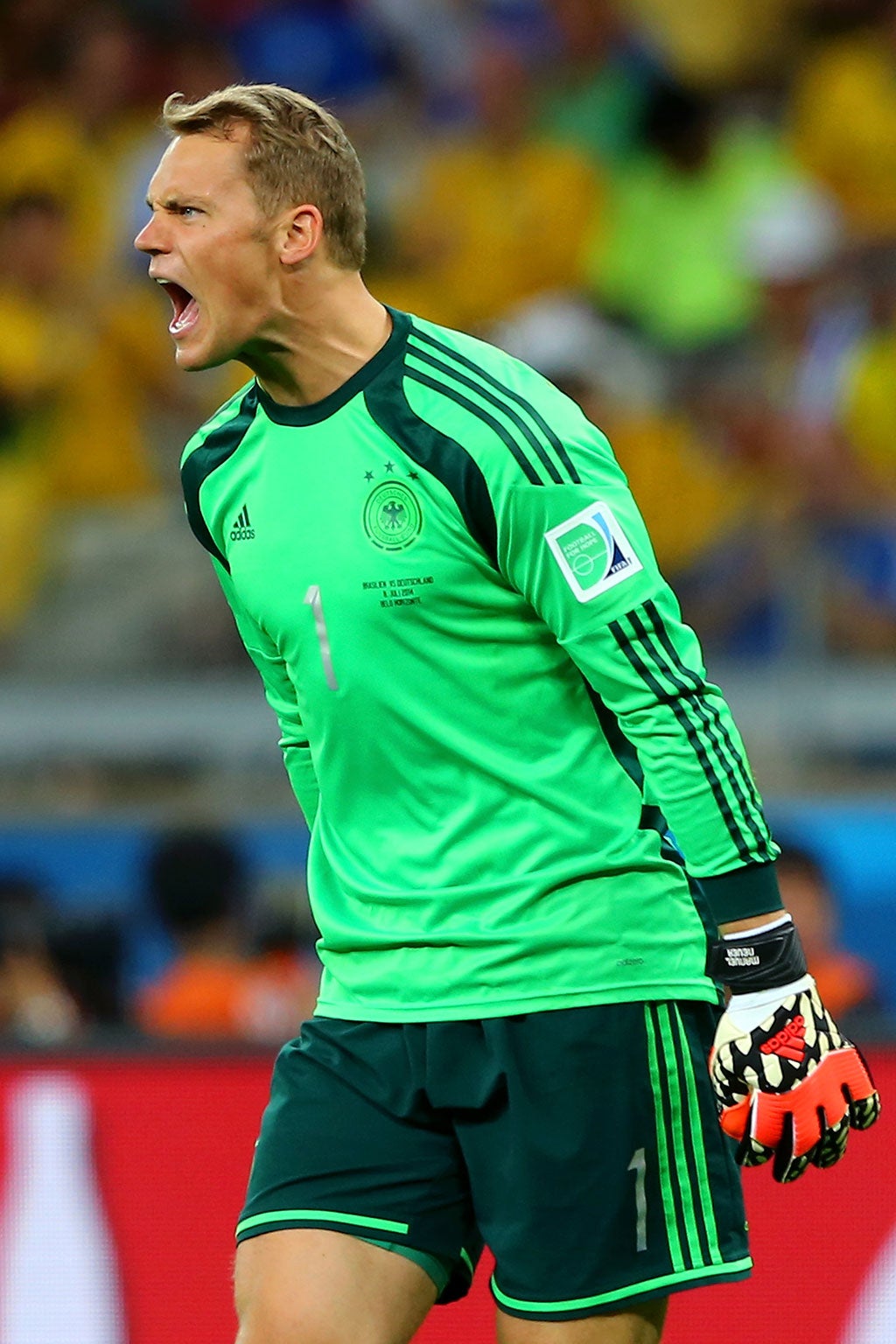 Manuel Neuer reacts at his defence after Oscar scores a consolation for Brazil