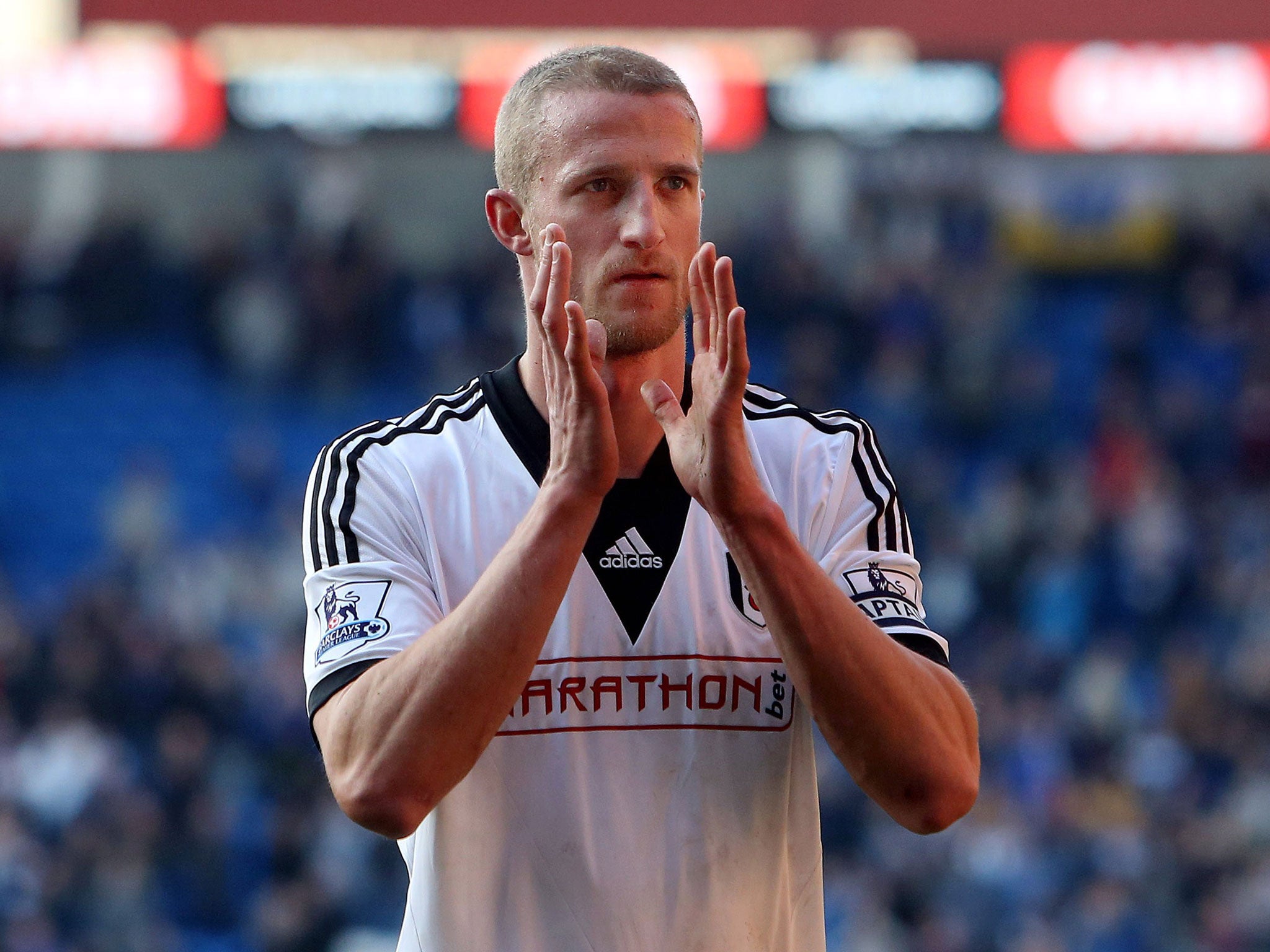 Brede Hangeland applauds supporters following the final whistle