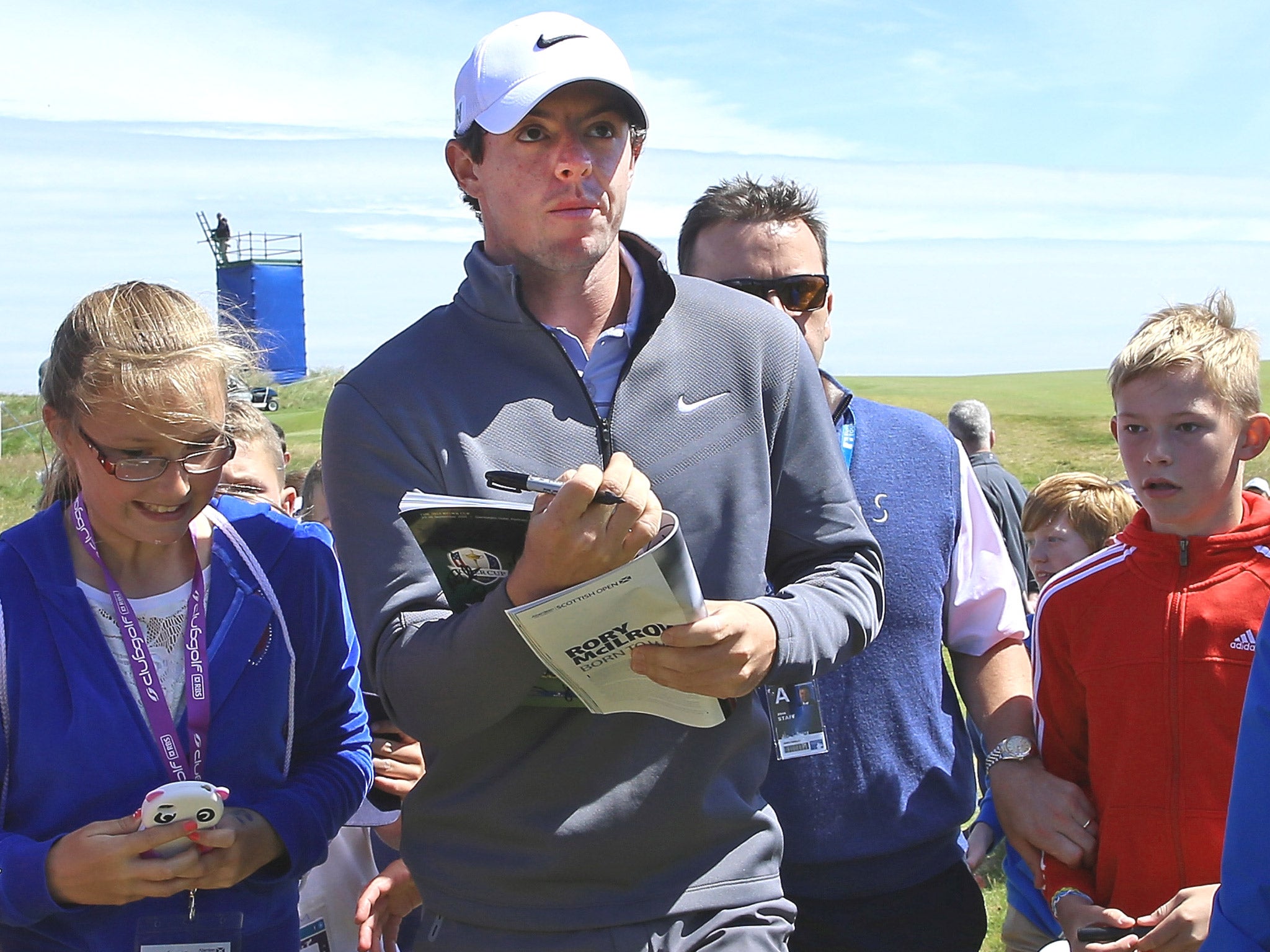 Rory McIlroy signing autographs for supporters