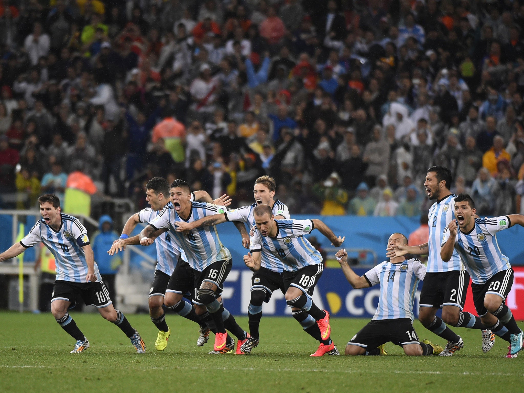 The Argentina players celebrate the victory