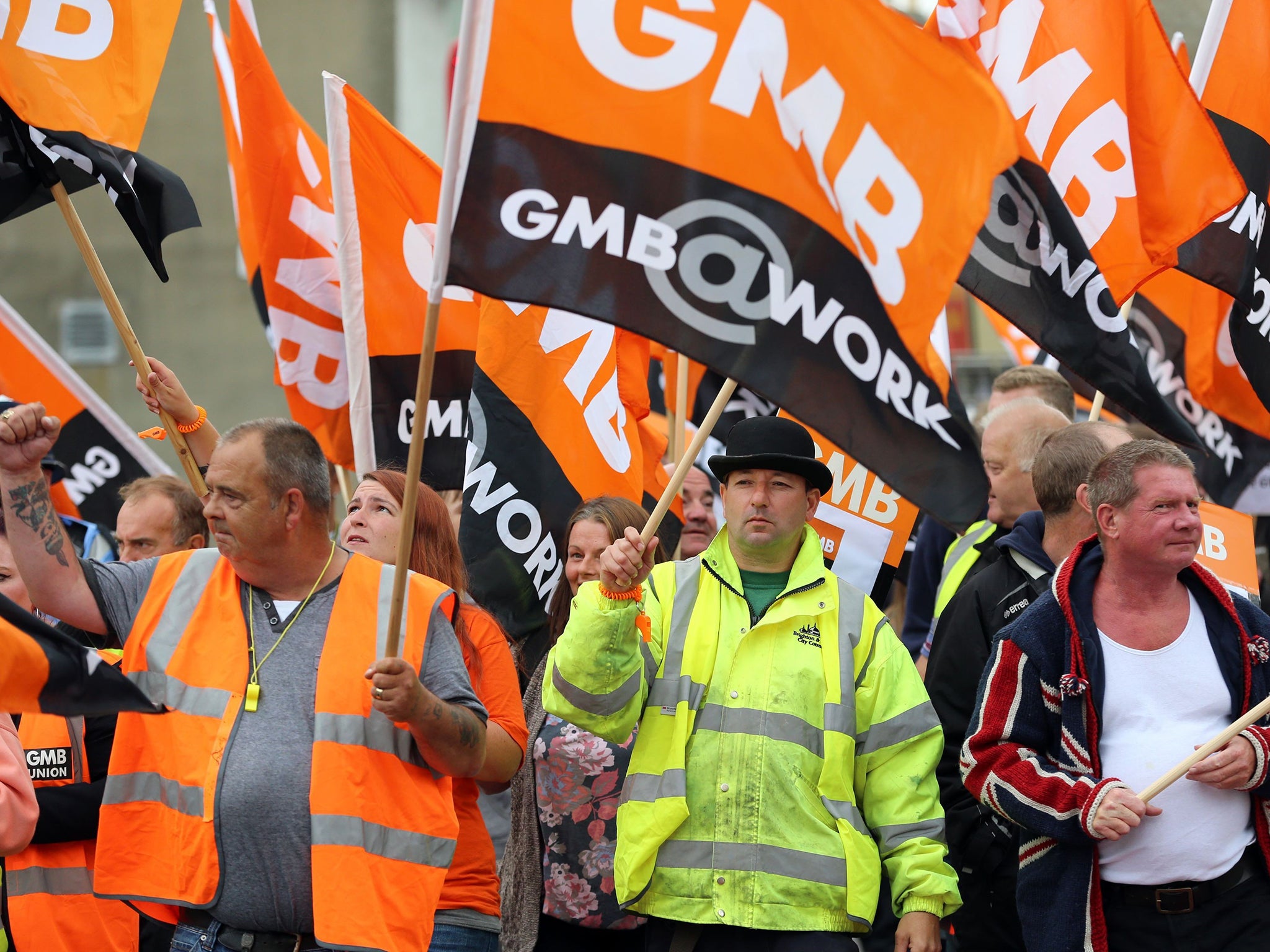Public sector workers and members of the GMB union make their way through Brighton, as they take part in the one-day walkout as part of bitter disputes over pay, pensions, jobs and spending cuts