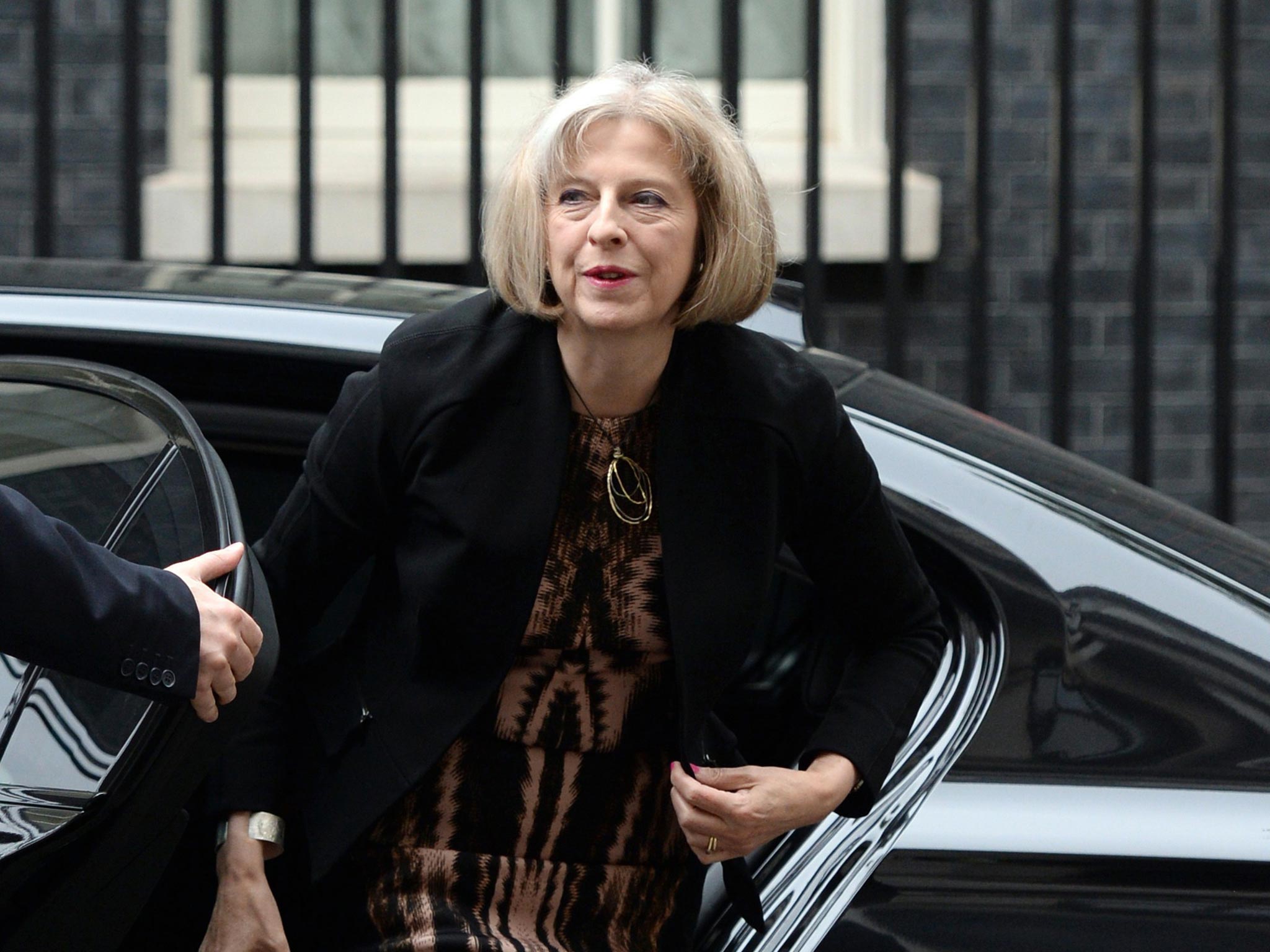 Theresa May arrives in Downing Street