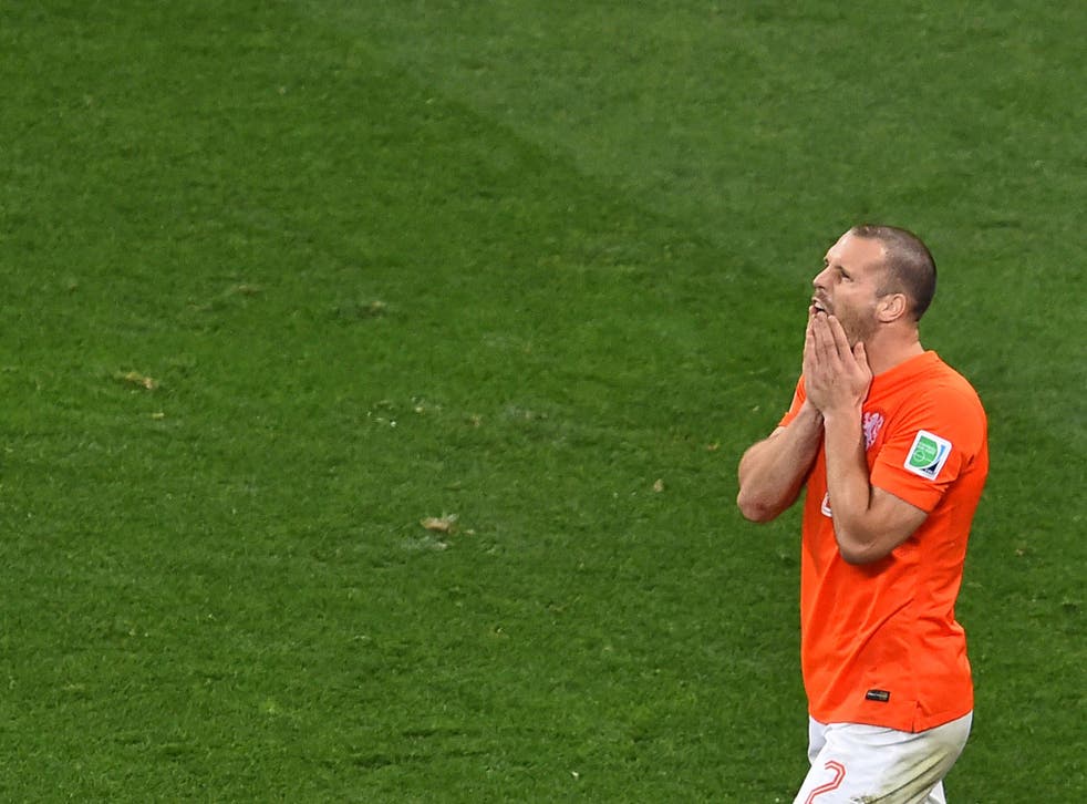 Ron Vlaar reacts after missing his penalty