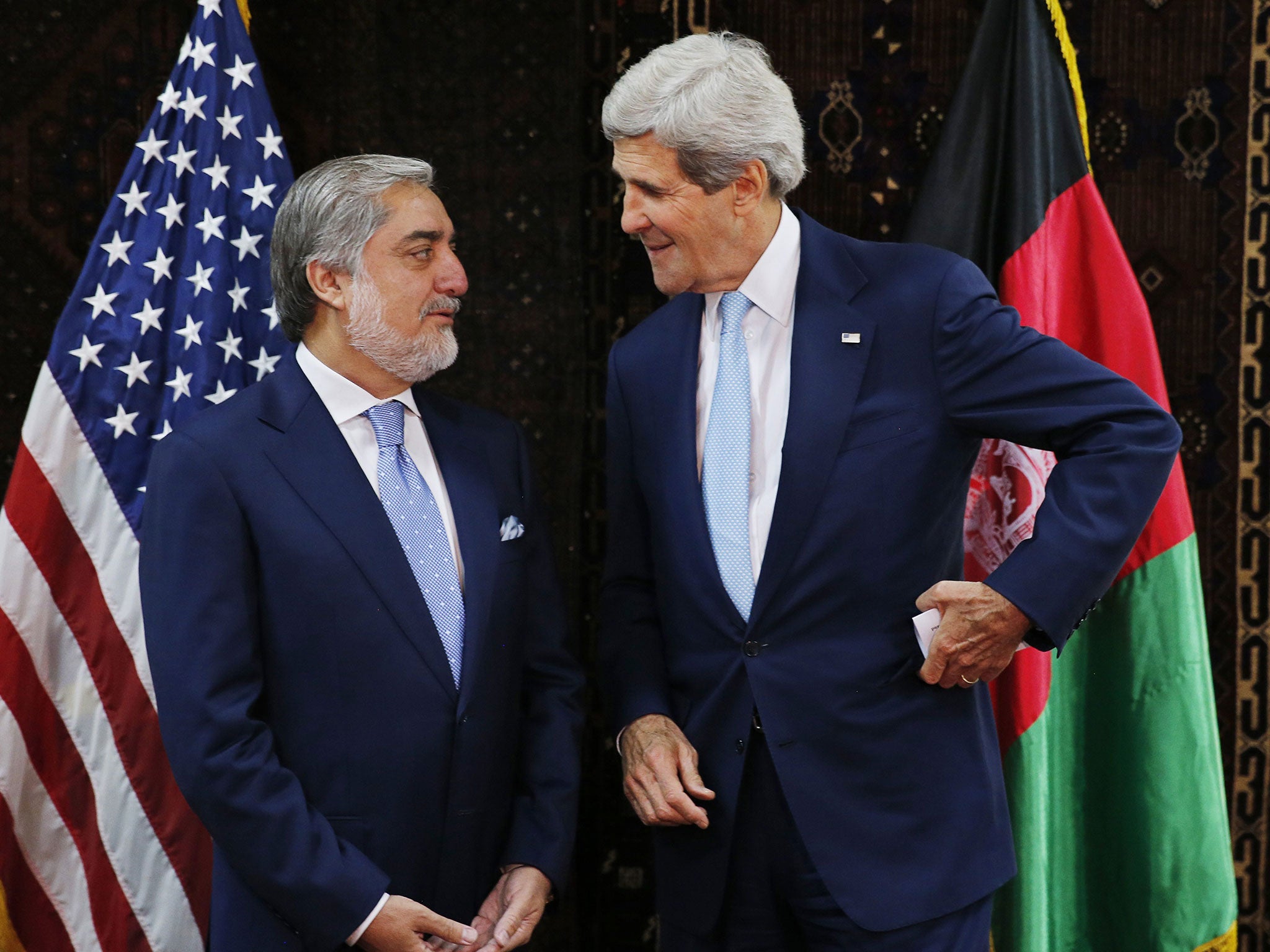 Afghan presidential candidate Abdullah Abdullah
(left) with US Secretary of State John Kerry yesterday