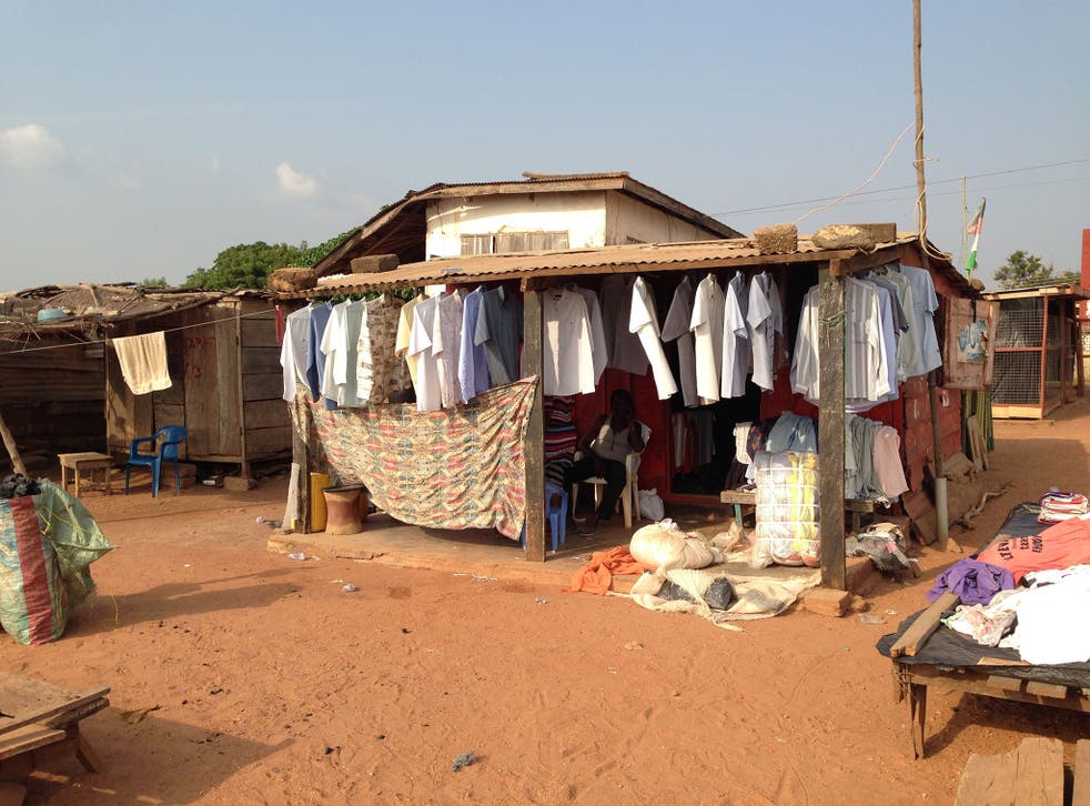 In Kumasi, bales of British charity clothing change hands
for £40
