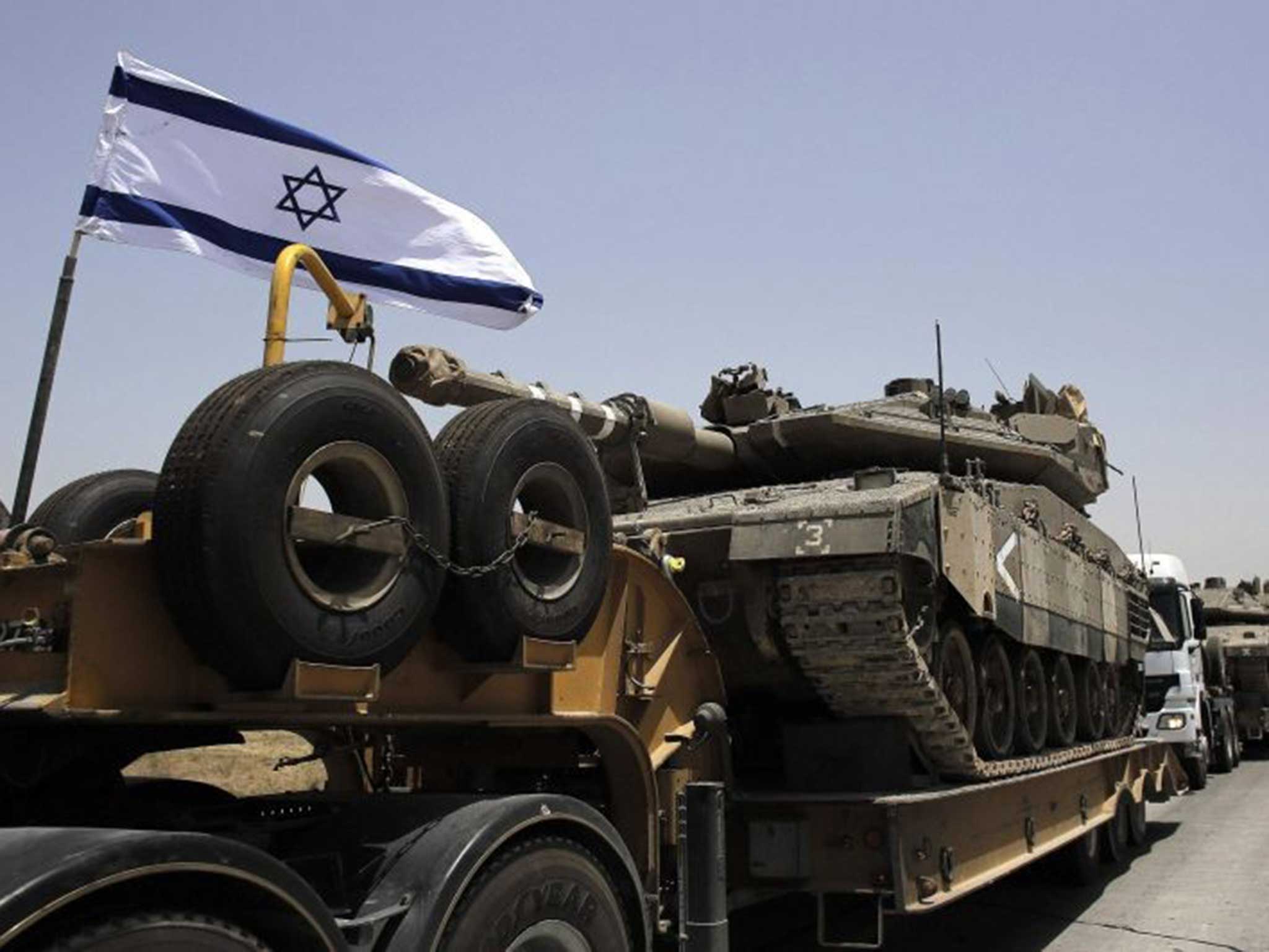 A convoy of Israeli lorries yesterday taking army tanks to the south