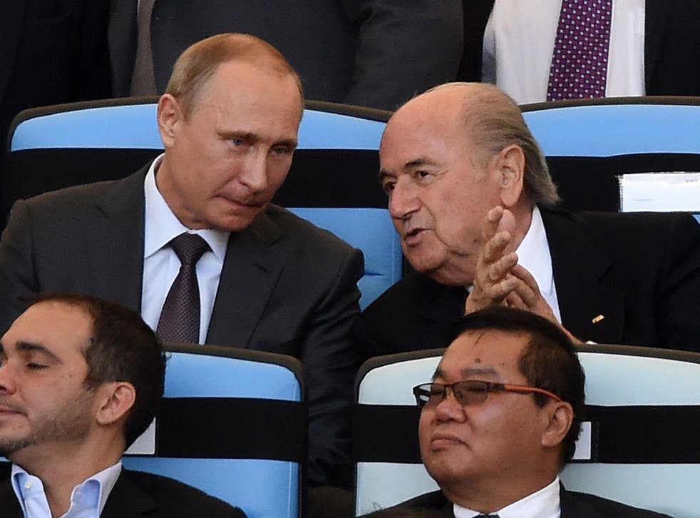 Sepp Blatter takes his seat for the World Cup final along with Vladimir Putin