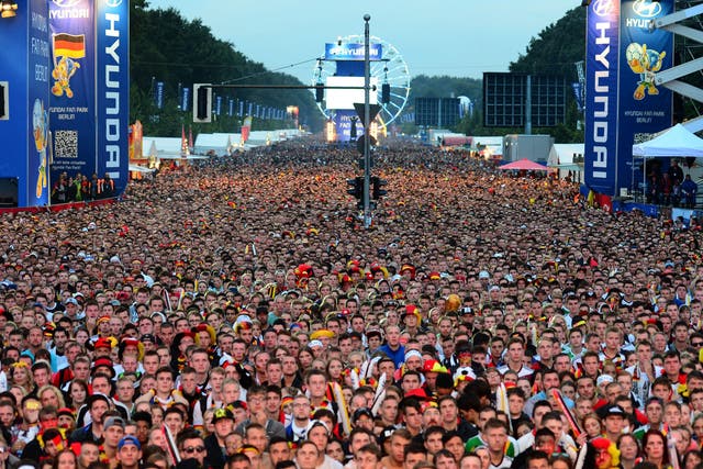 German fans pack in to watch the World Cup final at the Brandenburg Gate in Berlin