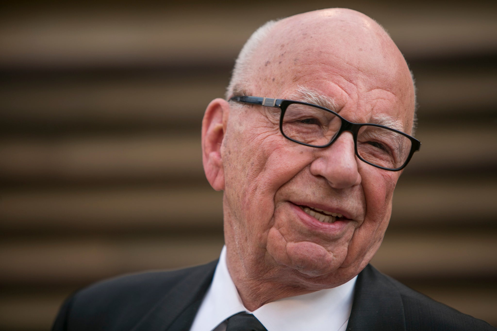 Rupert Murdoch has said climate change should be treated with scepticism