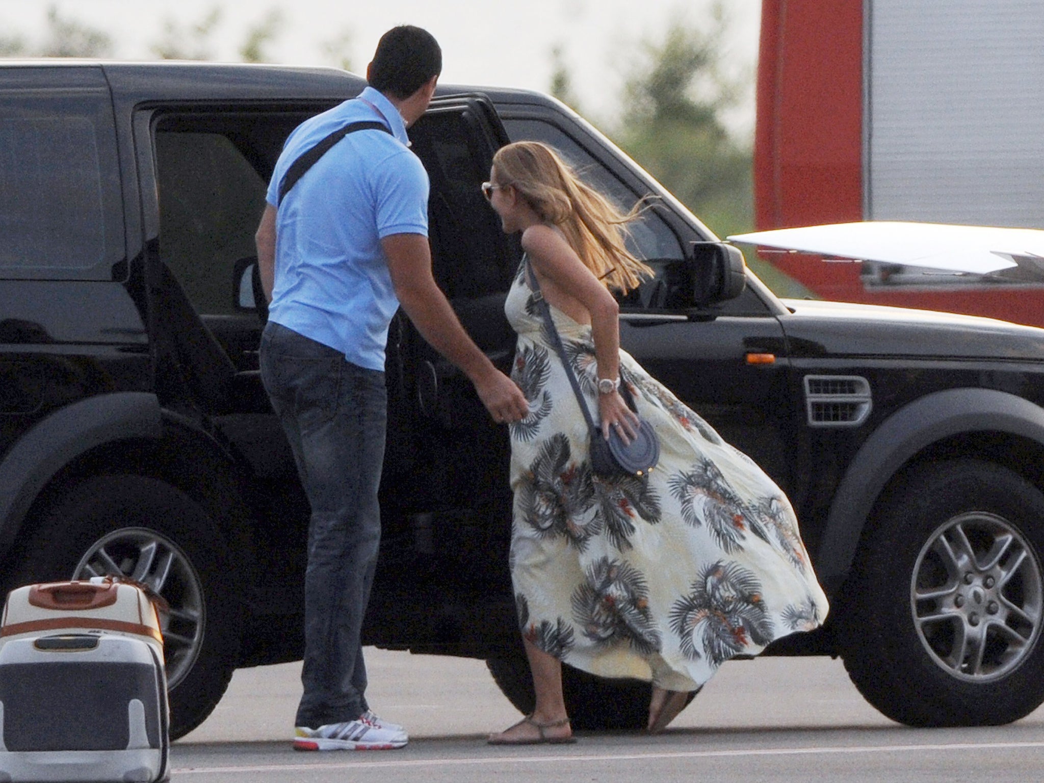 Jelena Ristic, longtime girlfriend and future wife of Serbian tennis player Novak Djokovic, enters a vehicle after landing at Tivat airport