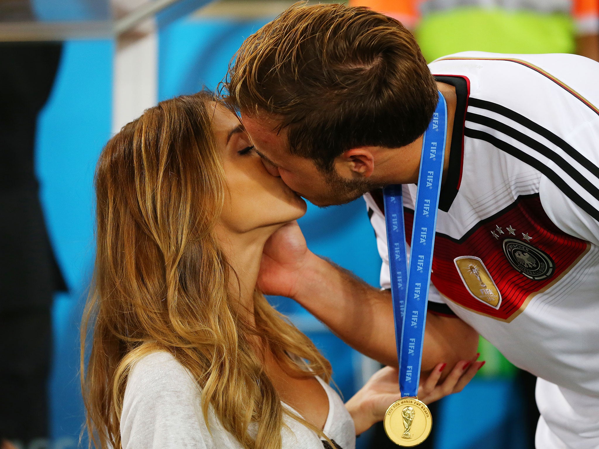 Mario Goetze of Germany kisses girlfriend Ann-Kathrin Brommel after defeating Argentina 1-0 in extra time during the 2014 FIFA World Cup Brazil Final