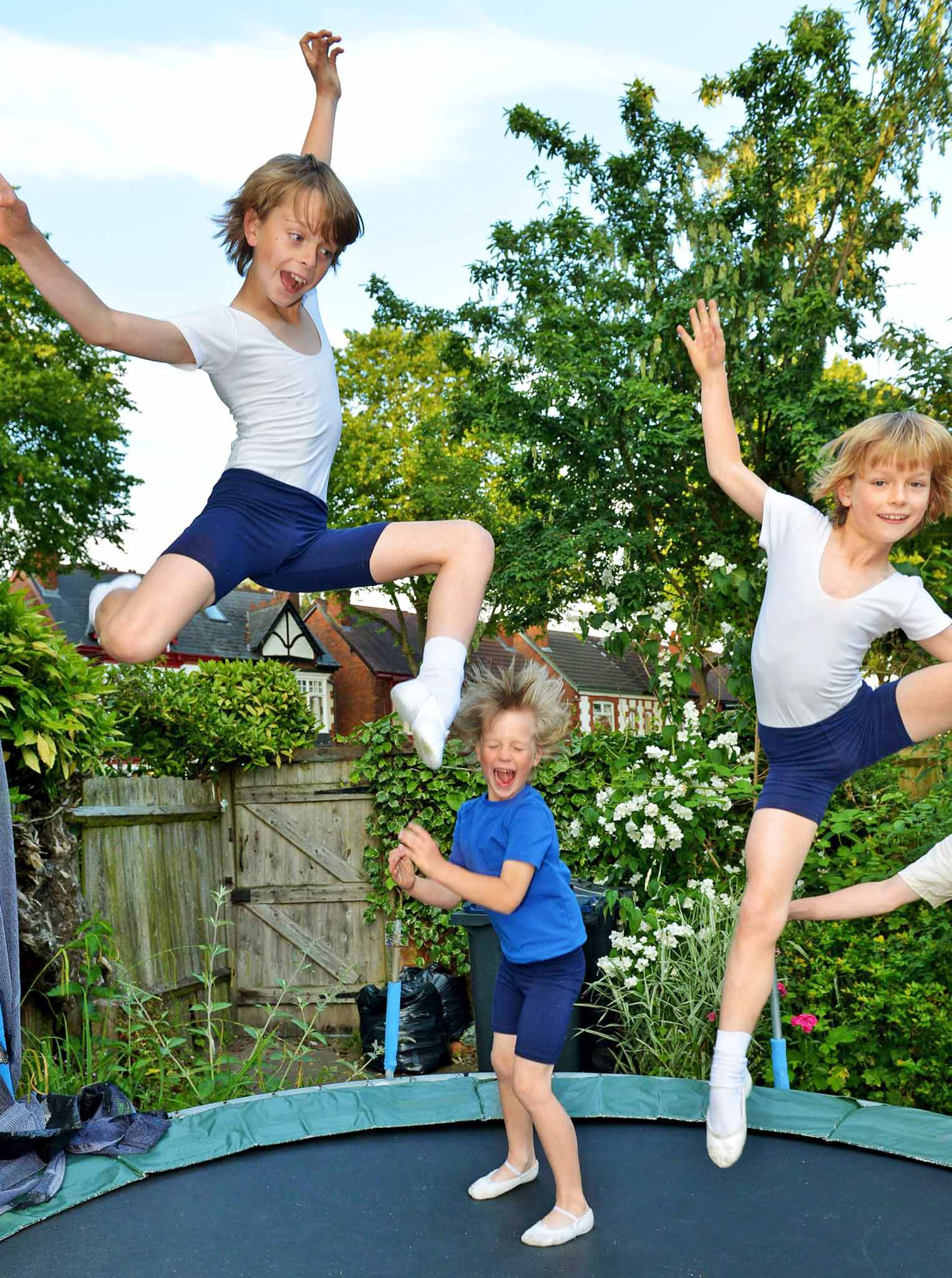The Kempsey-Fagg boys: Oscar, 11, Arlie, 6, and Marlo, 8, show their flexibility