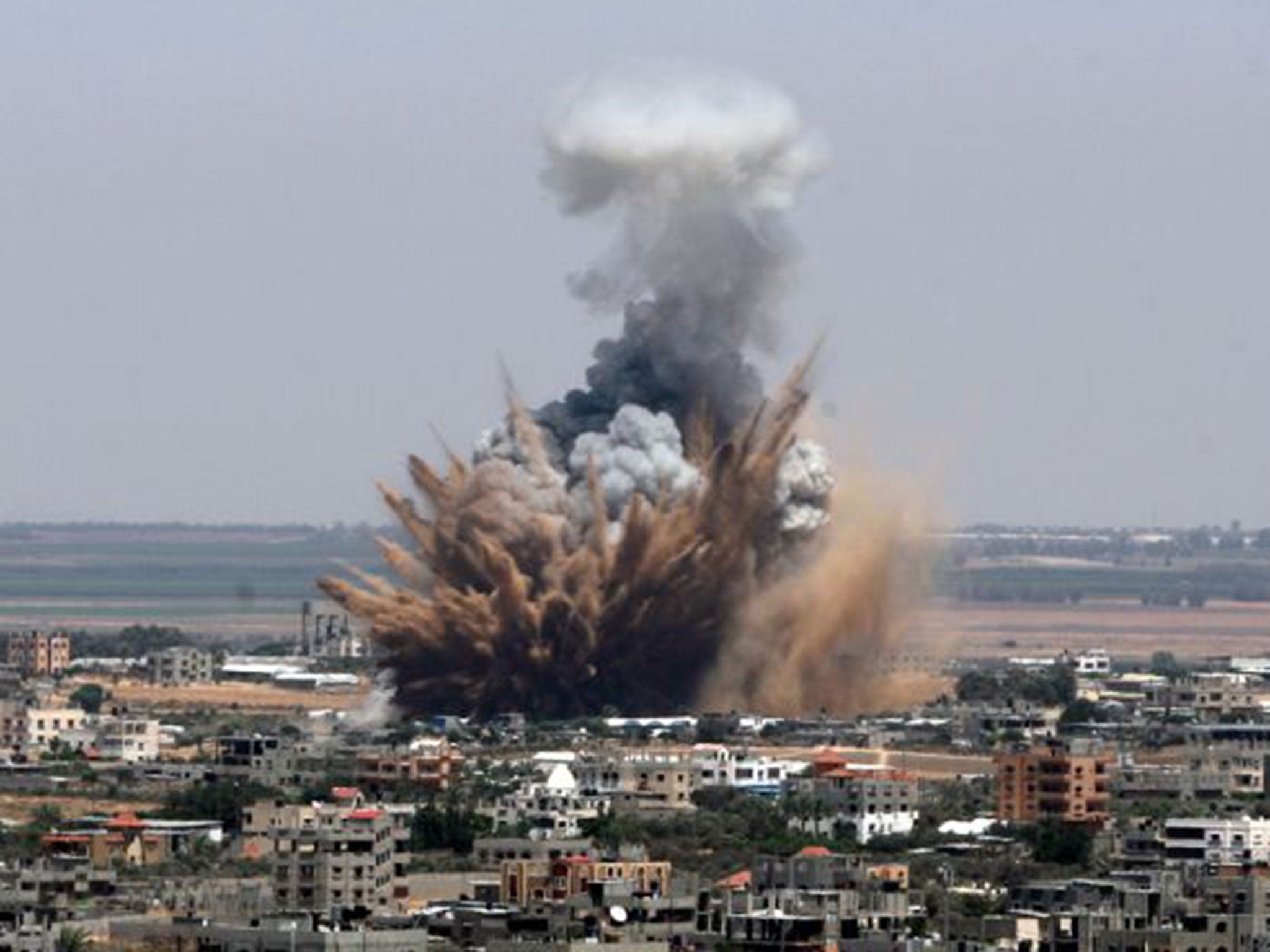 An explosion from an Israeli air attack in Gaza city on 8th July 2014. However, analysis has found that some of the pictures of violence circulated on the #gazaunderattack thread were recycled images from as long ago as 2007