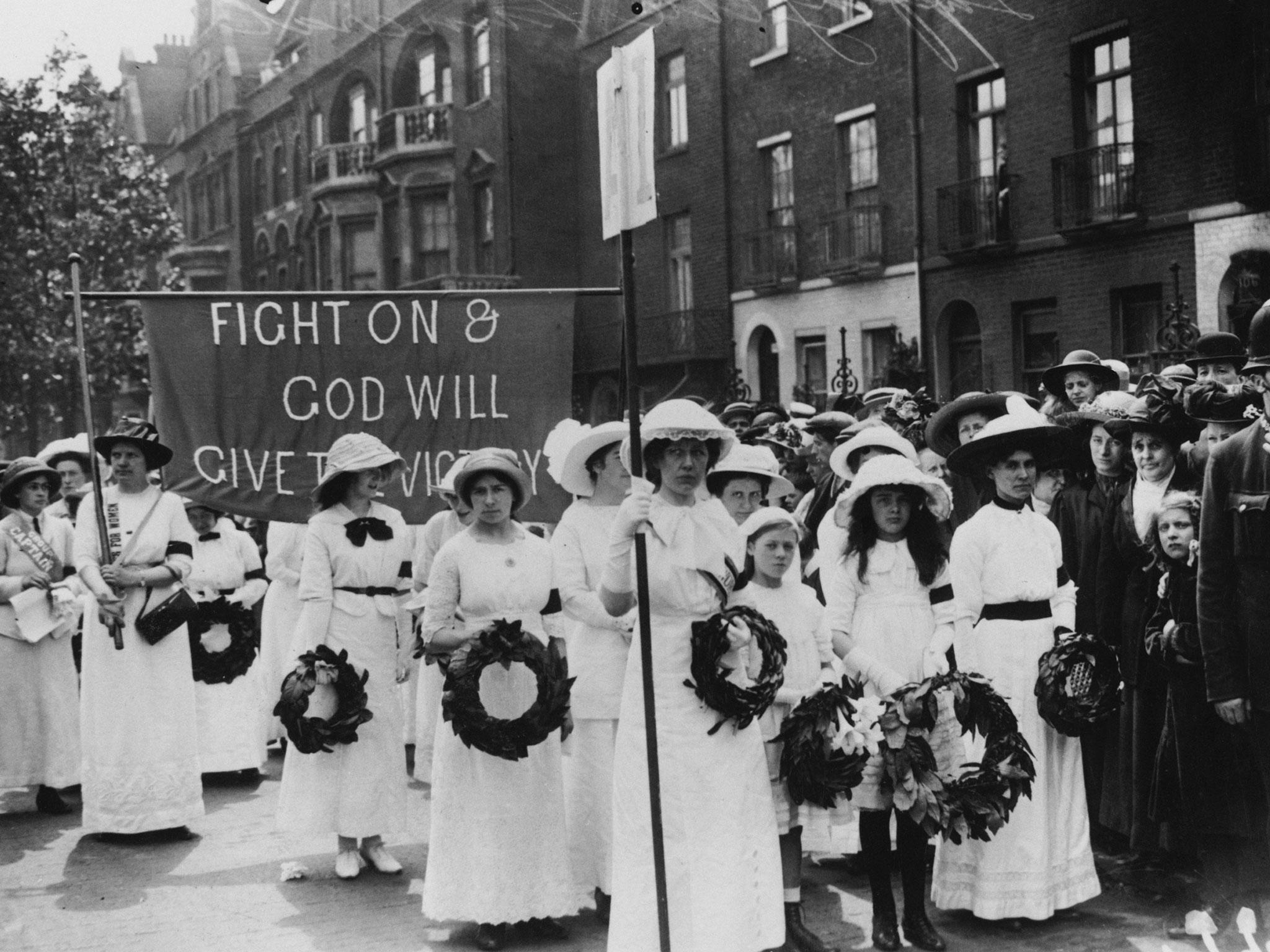 Suffragettes in the funeral procession of English suffragette Emily Davison on14th June 1913.