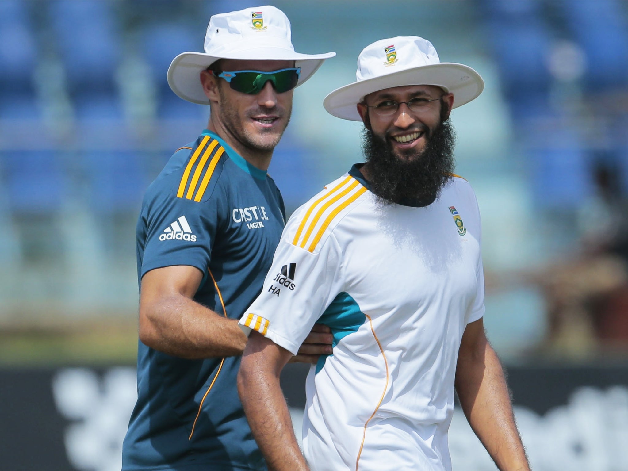 Hashim Amla (right) and Faf du Plessis warm up in Galle