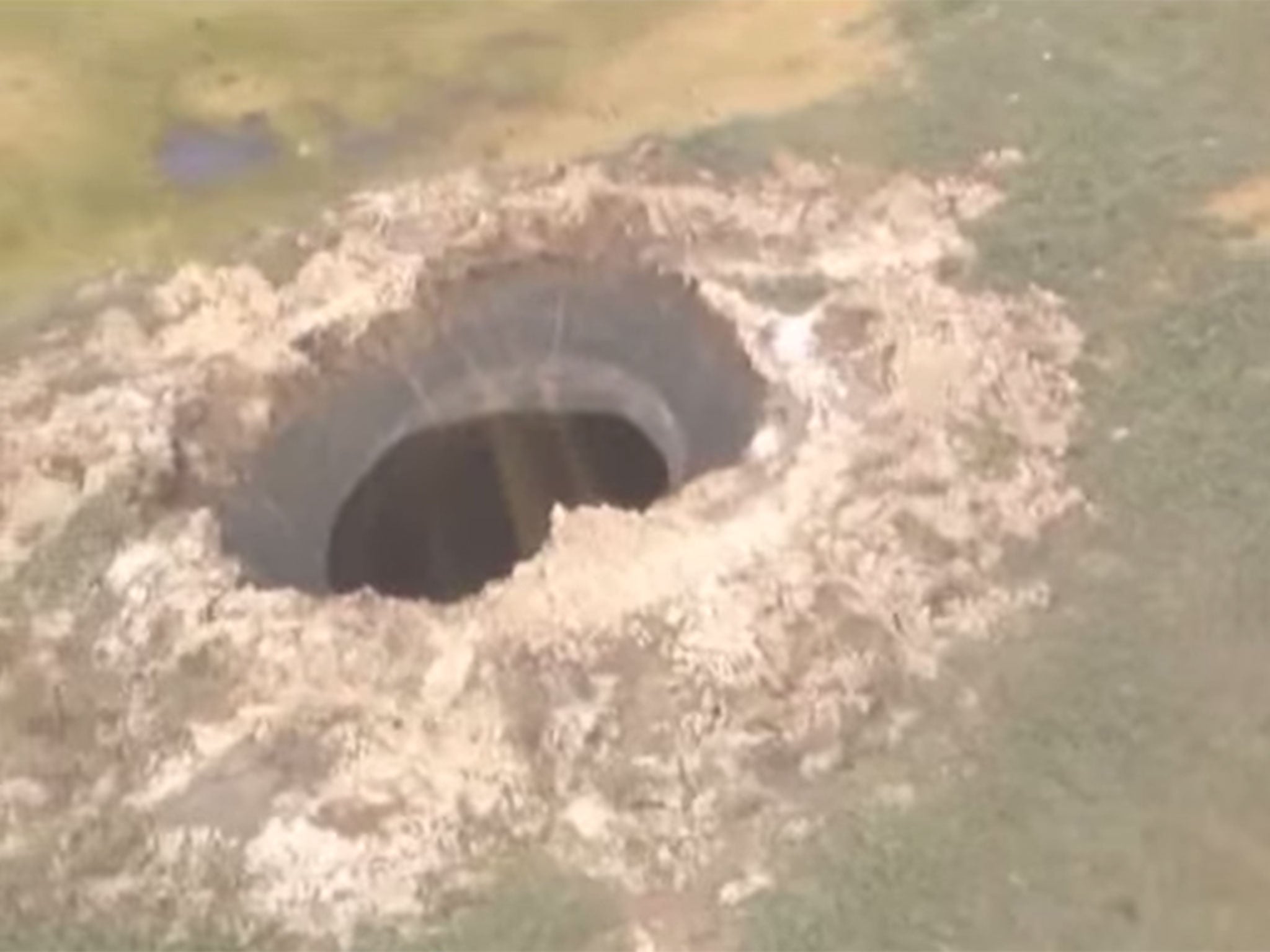 Giant Hole Appears At The End Of The World In Siberia The Independent The Independent