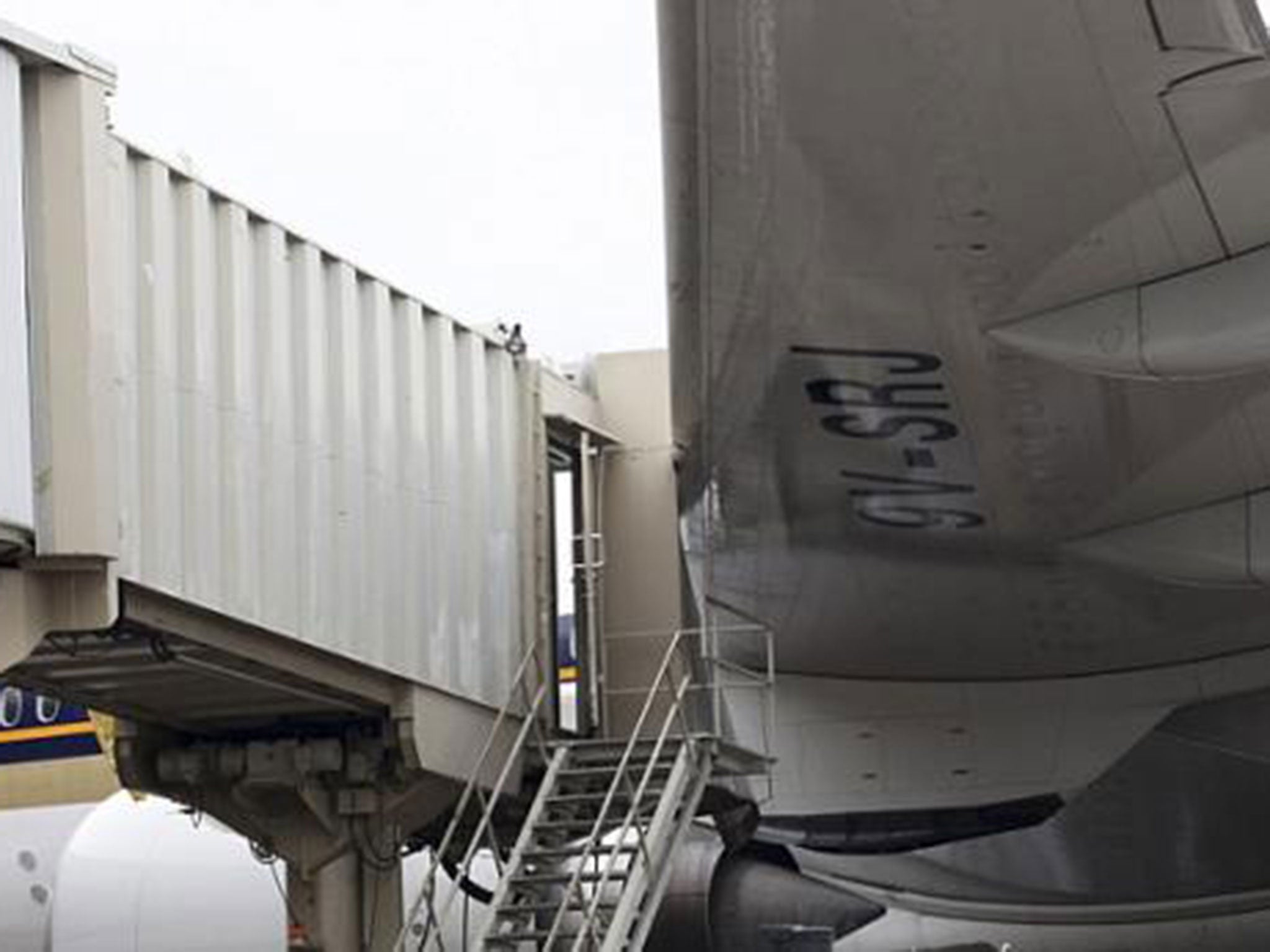 The storm caused damage across the capital, including one Singapore Airlines aeroplane crashing into an aerobridge at Manila international airport