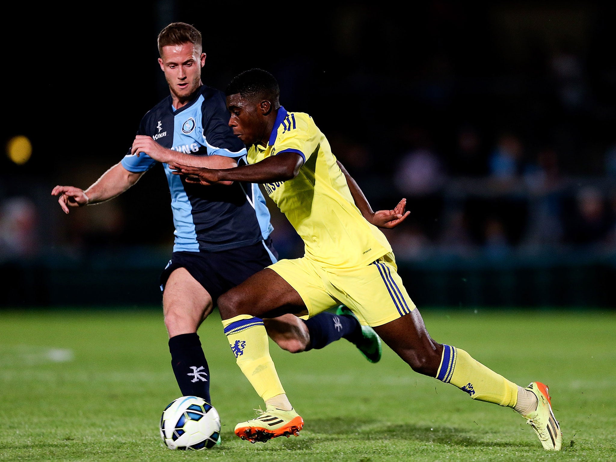 Jeremie Boga of Chelsea advances under pressure from Nathan Evans of Wycombe duing the pre season friendly match between Wycombe Wanderers and Chelsea at Adams Park