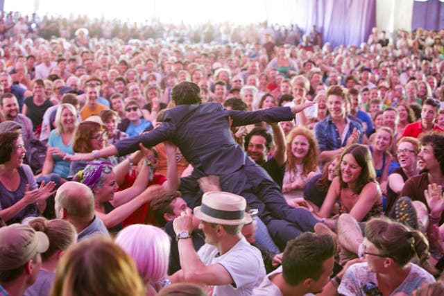 Marcel Lucont surfs the crowd at Latitude