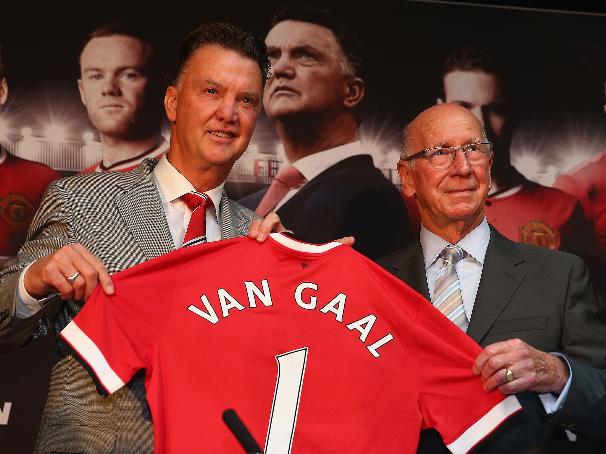 Louis van Gaal is unveiled at Manchester United alongside club ambassador Sir Bobby Charlton