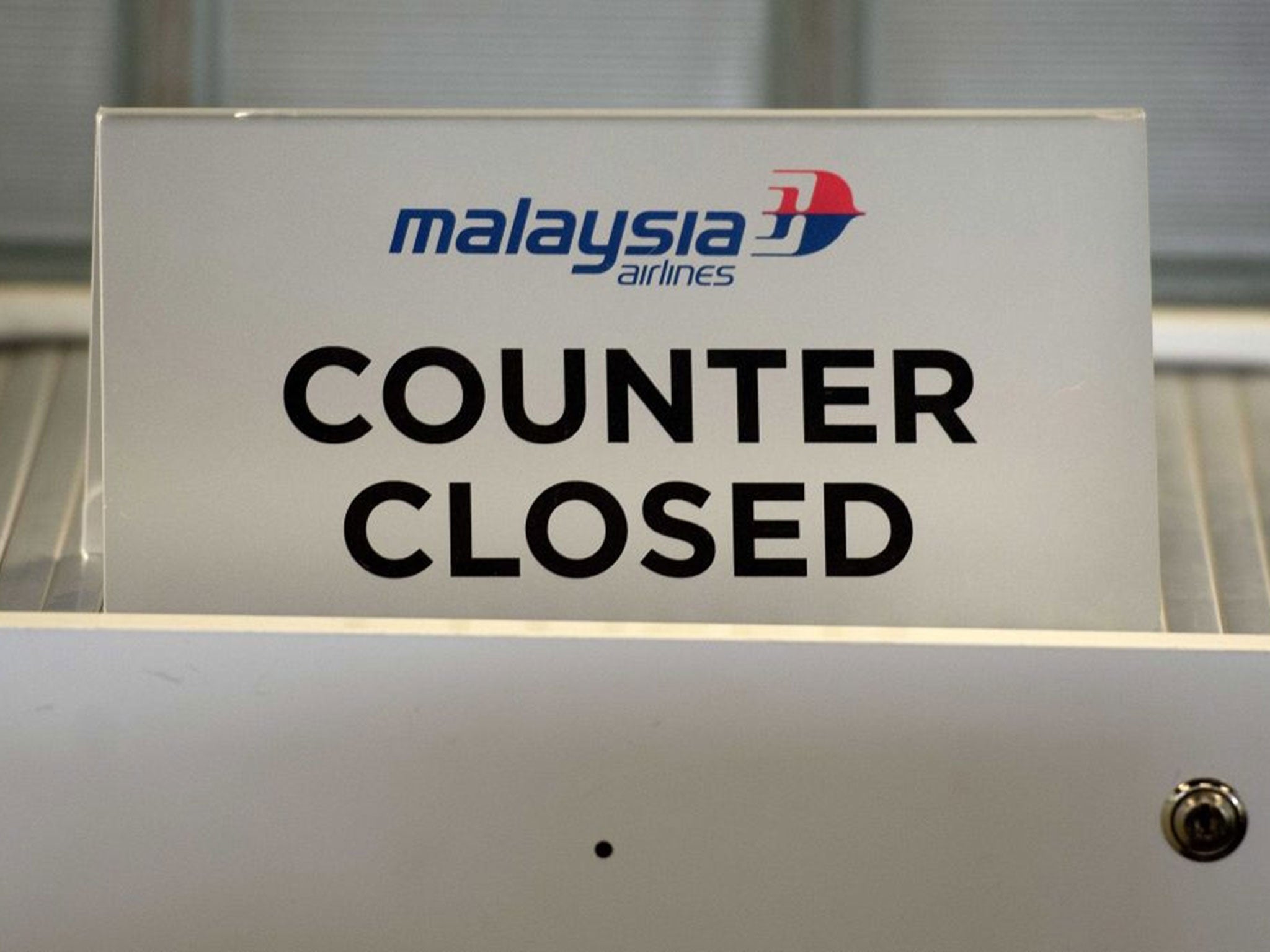 A closed Malaysia Airlines counter at Schiphol airport near Amsterdam